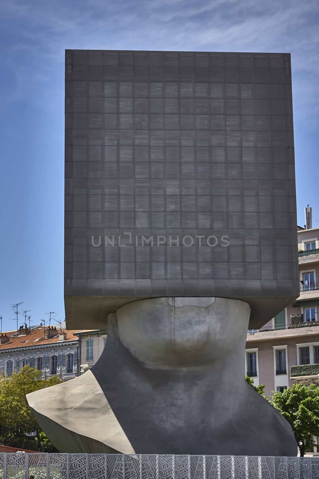 The Tête Carrée: A very characteristic Nizzaa monument: The lower part of a man's head with cube shaped top: seven-story sculpture in the center of the city.