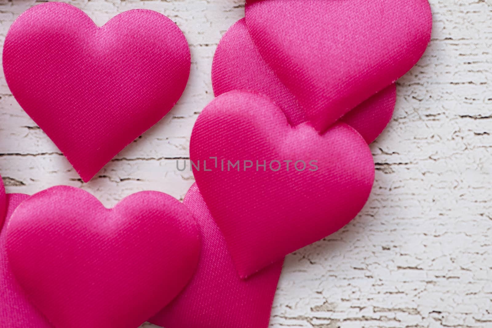 Valentines day romantic background, happy holiday on February 14, love concept. Postcard on a wooden background, decorated with hearts. Decorative card for the holiday. Vanentine Day.