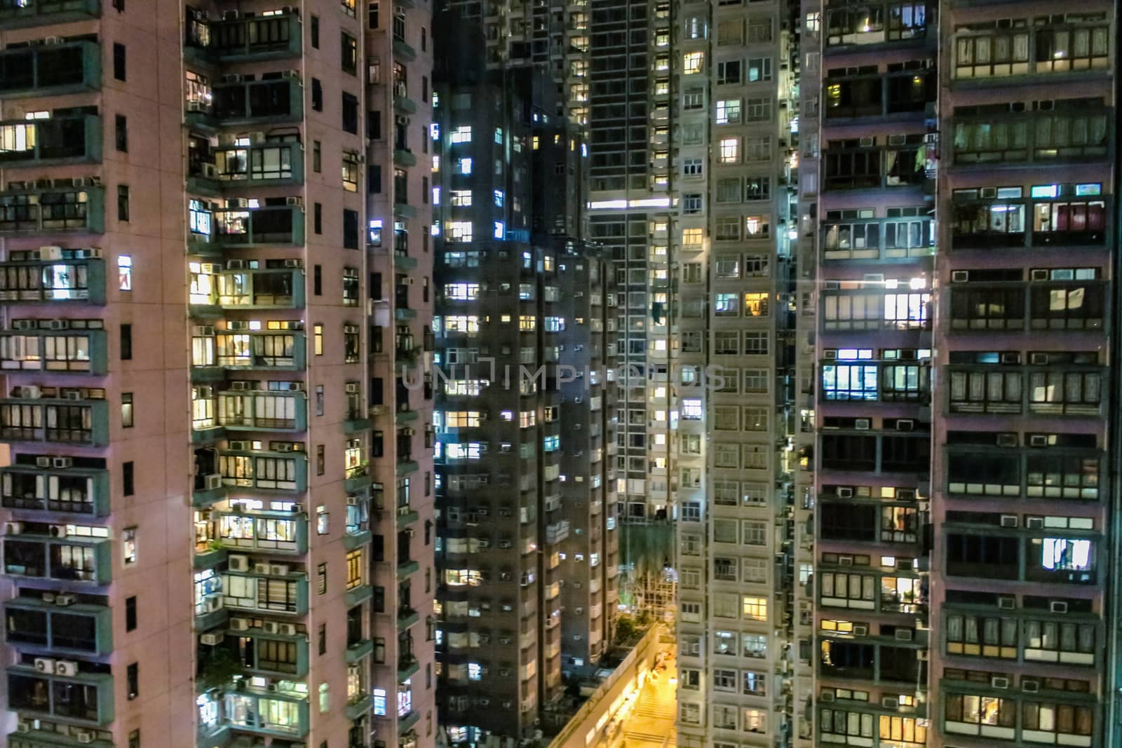 The skyscrapers of Hong Kong close up at night. by rdv27