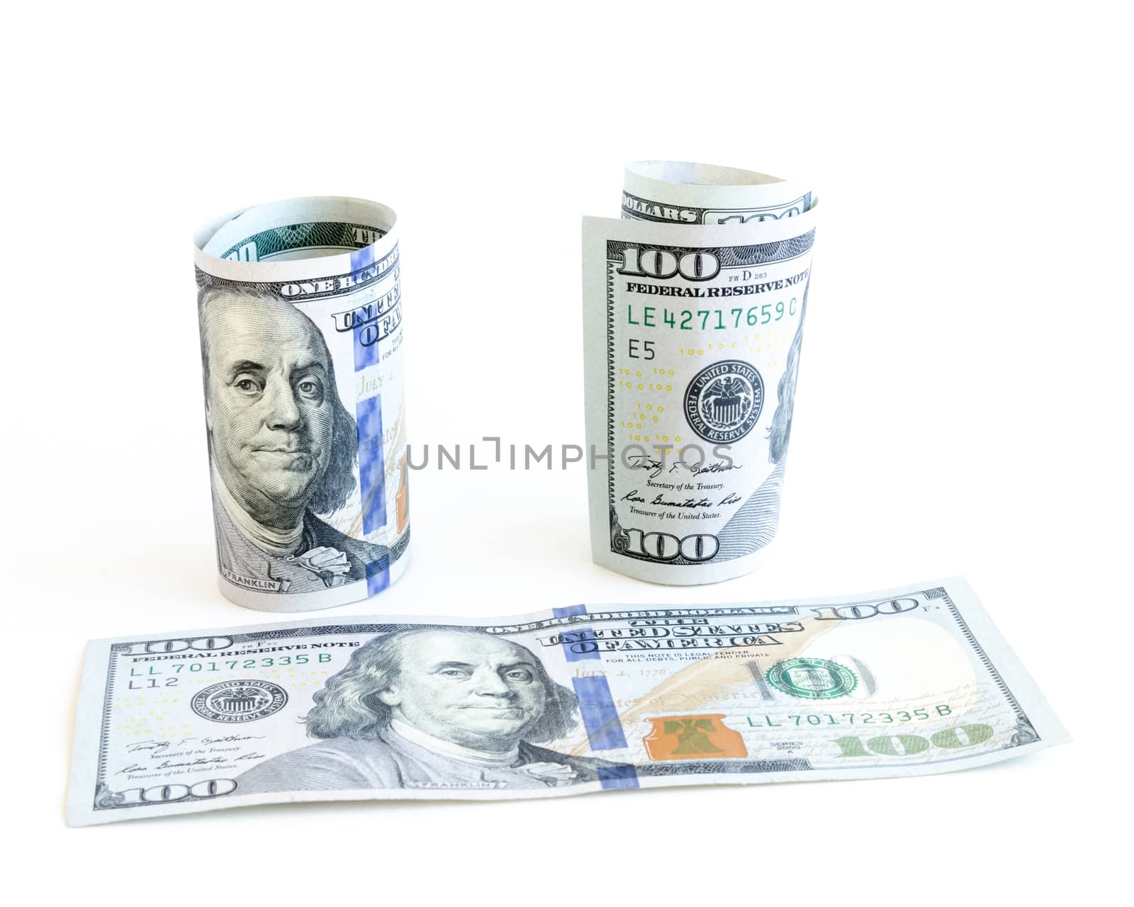 One hundred (100) dollars banknote isolated on white background. Roll and flat largest denominations of US currency. Currency, business and finance concept.