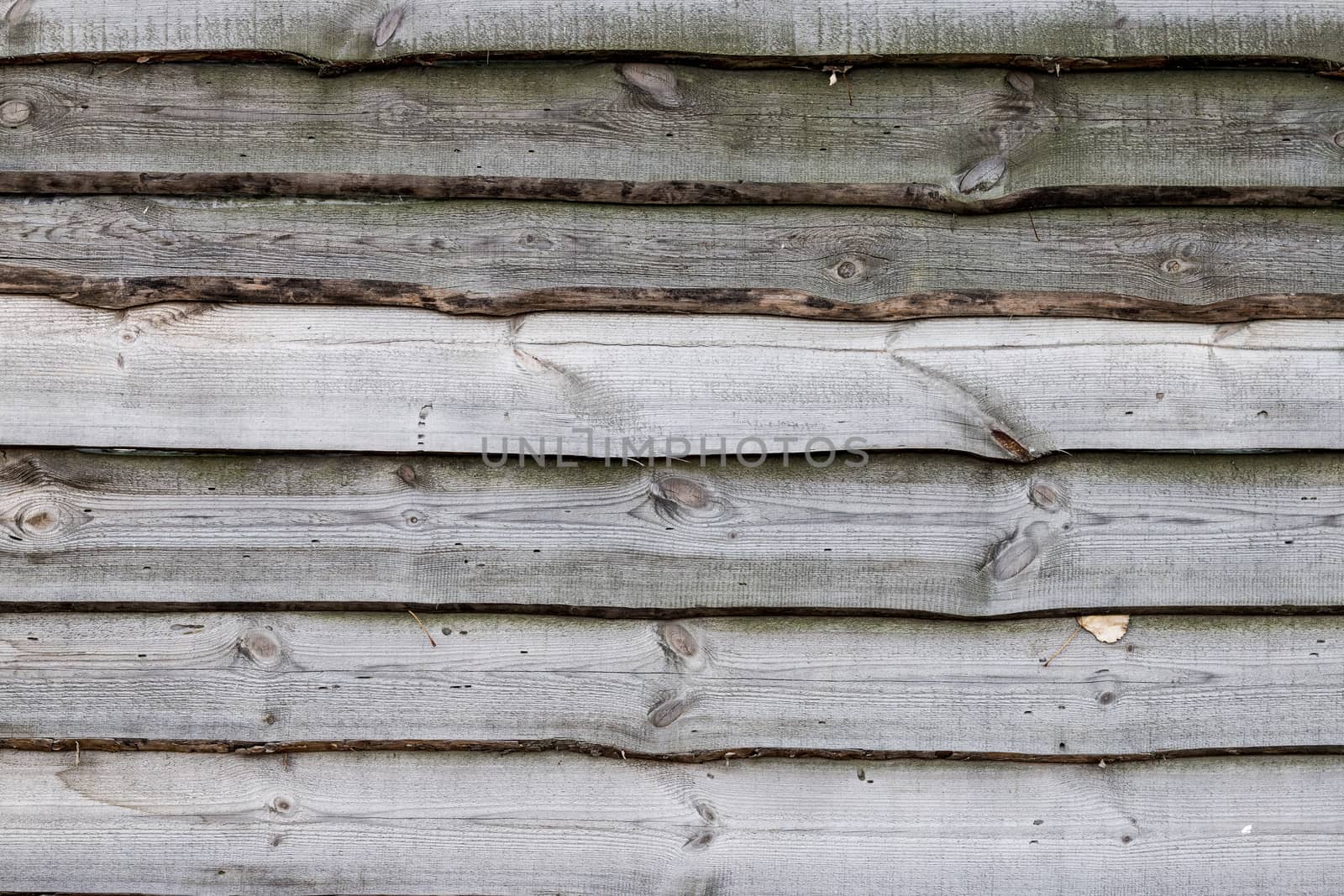 Light and dark gray wood plank background. Wall floor or fence exterior design. Natural wooden material backdrop