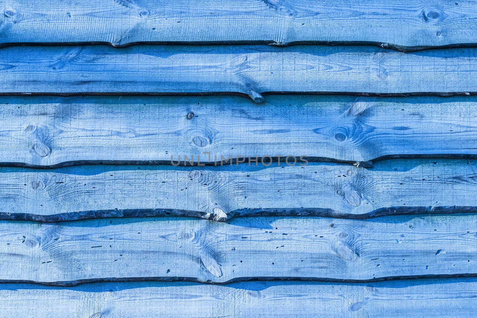 Old blue wood plank background. Wall floor or fence exterior design. Natural wooden material backdrop