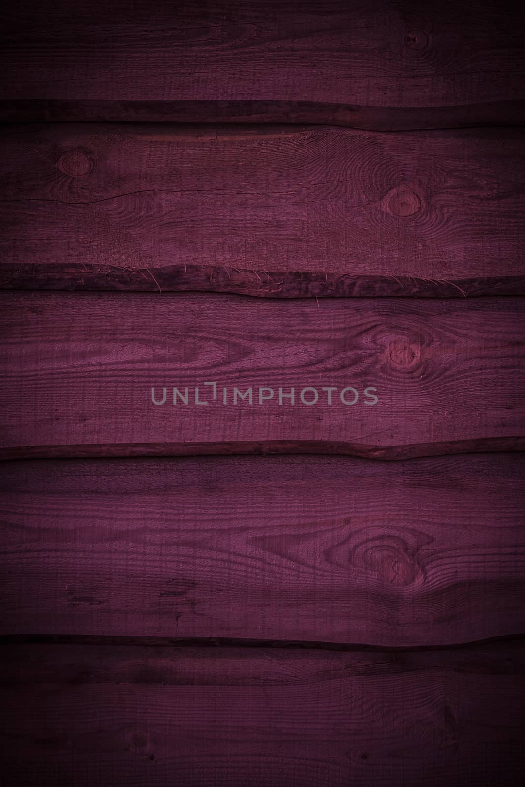 Dark pink wood plank backdrop. Natural wooden material background. Beautiful smartphone wallpaper. Wall floor or fence exterior design