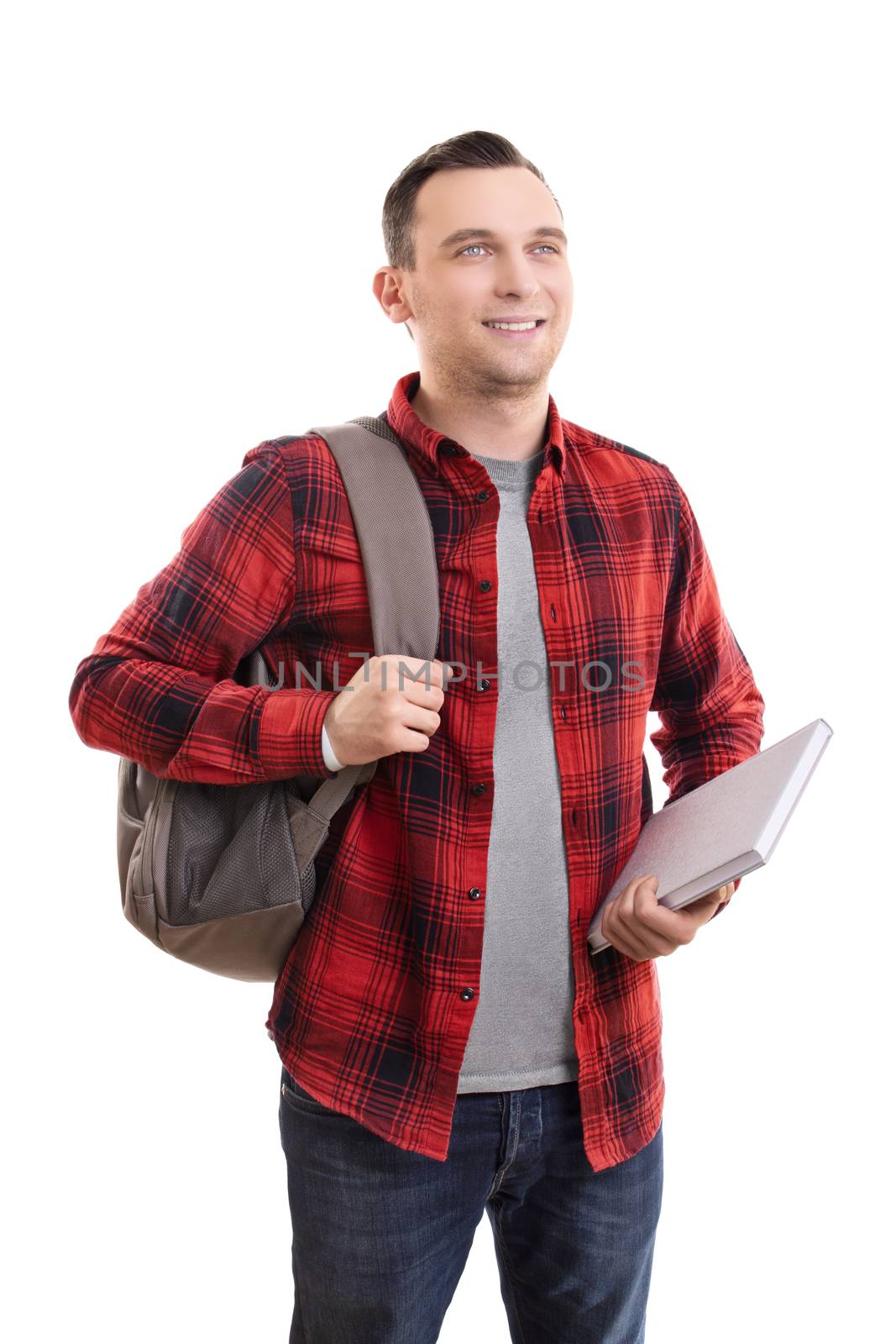 Smiling male student in casual clothing with backpack and notebo by Mendelex