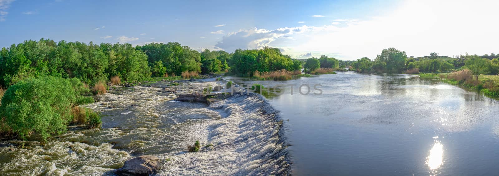 Southern Bug river in Mygiya village, Ukraine, on a sunny summer day