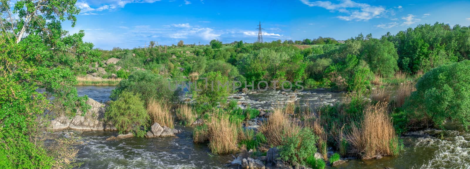 Southern Bug river in Mygiya village, Ukraine, on a sunny summer day