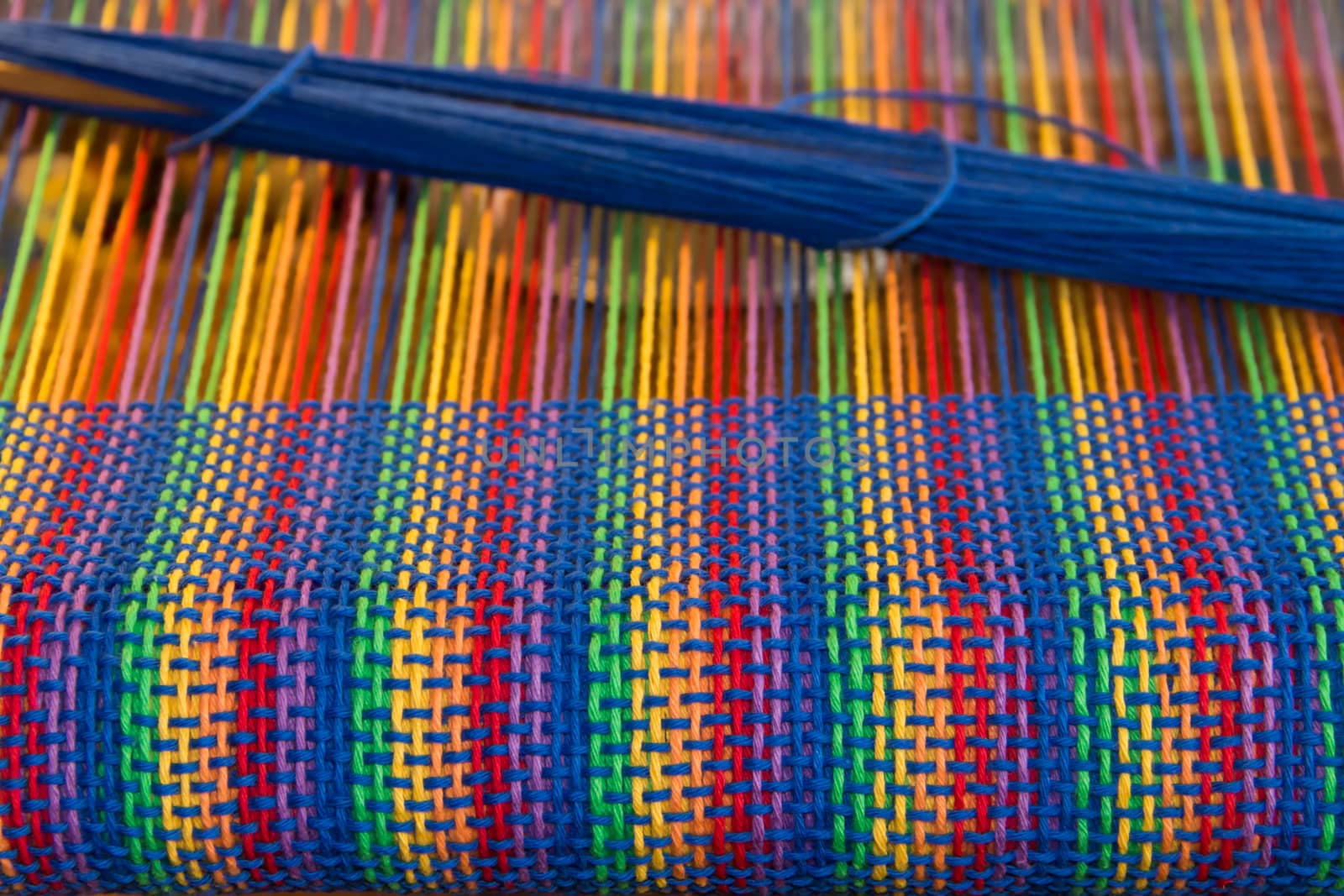 Comb loom with rainbow colors and diversity flag by GabrielaBertolini