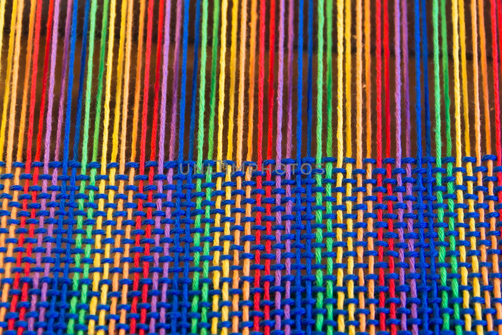 Comb loom with rainbow colors and diversity flag by GabrielaBertolini