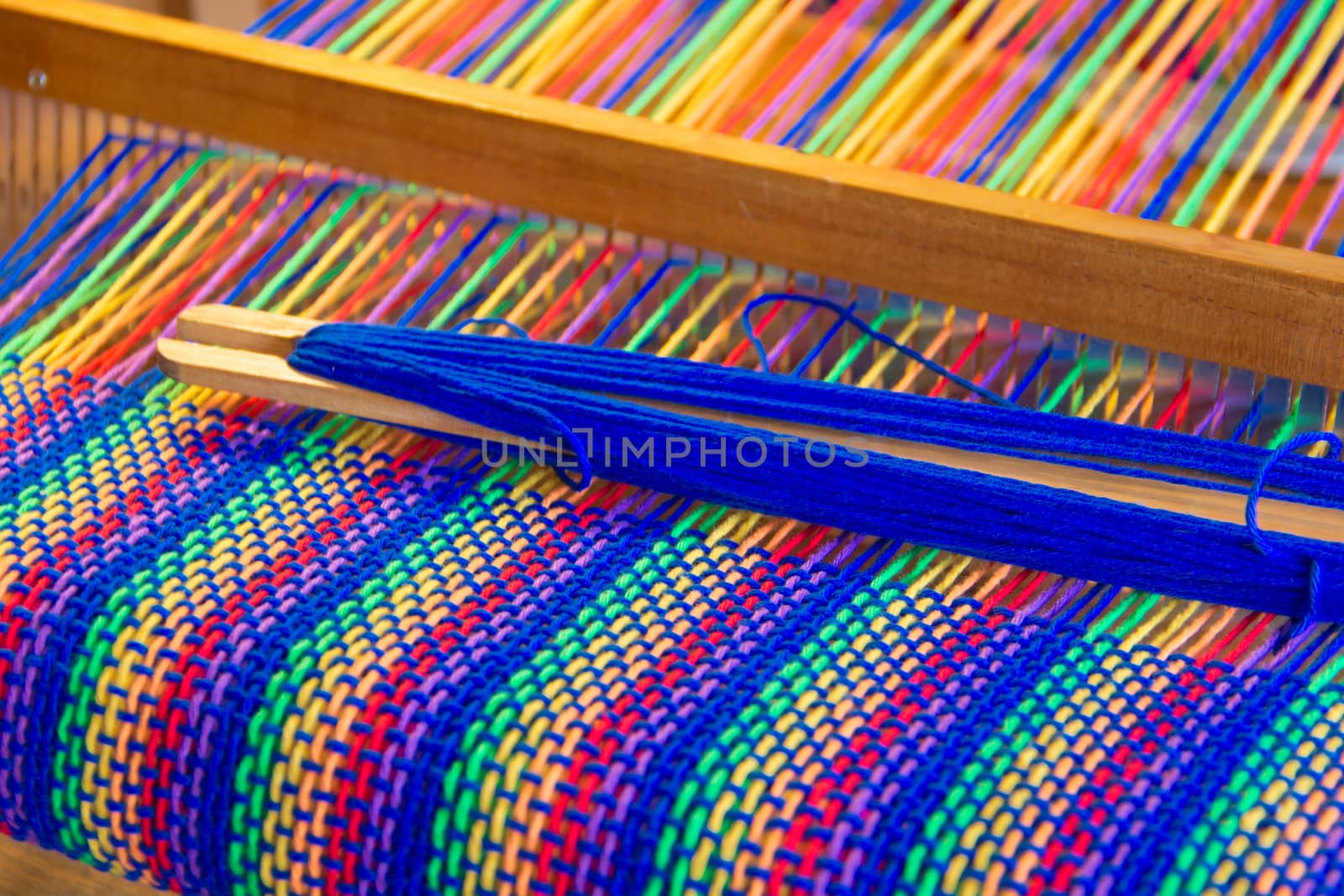 Comb loom with rainbow colors and diversity flag