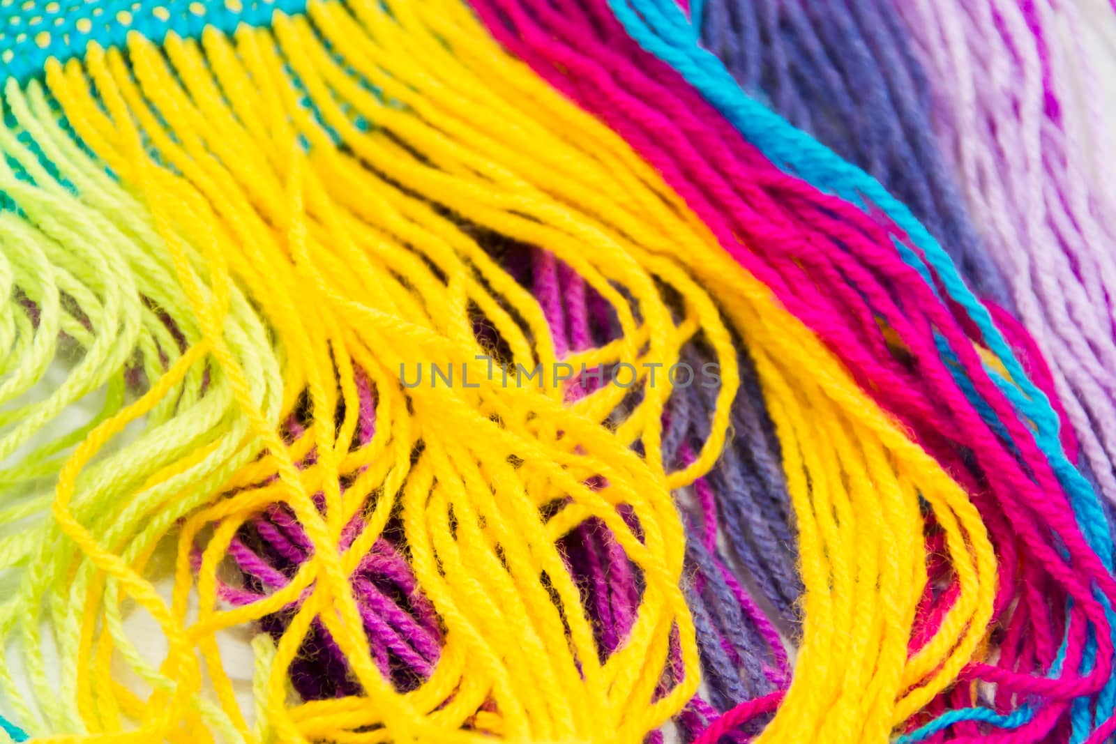 textured background of colorful woolen threads by GabrielaBertolini