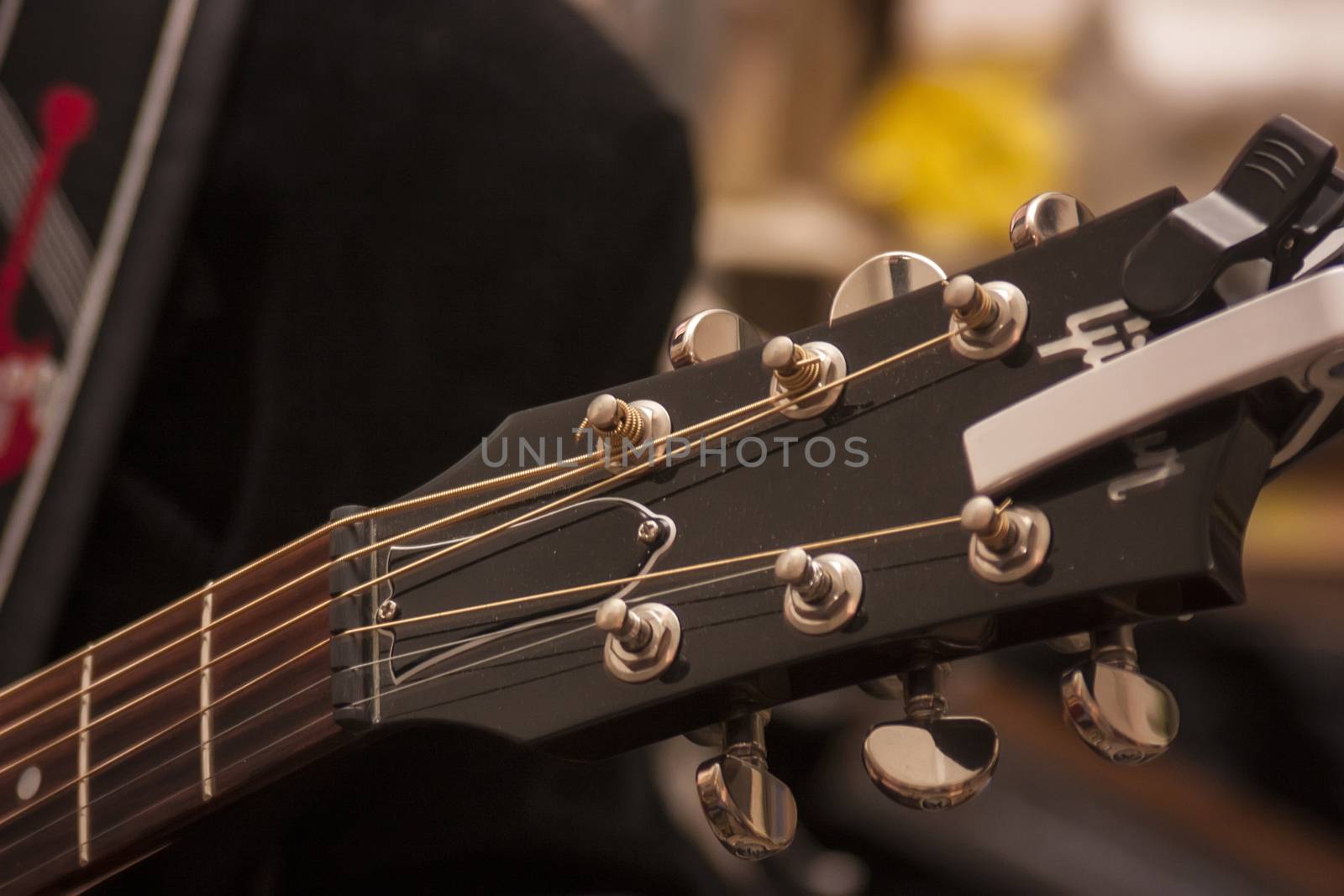 Detail of the headstock of a guitar. by pippocarlot