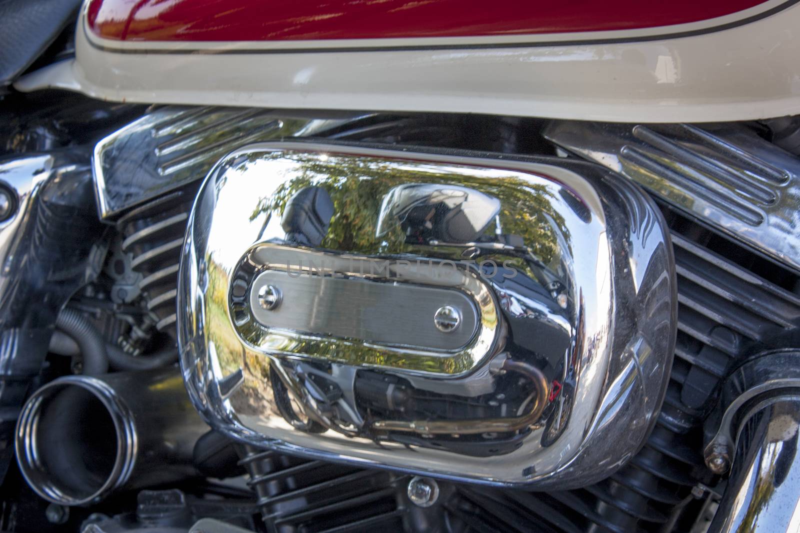 Chromed and metal parts of the motor of a custom bike