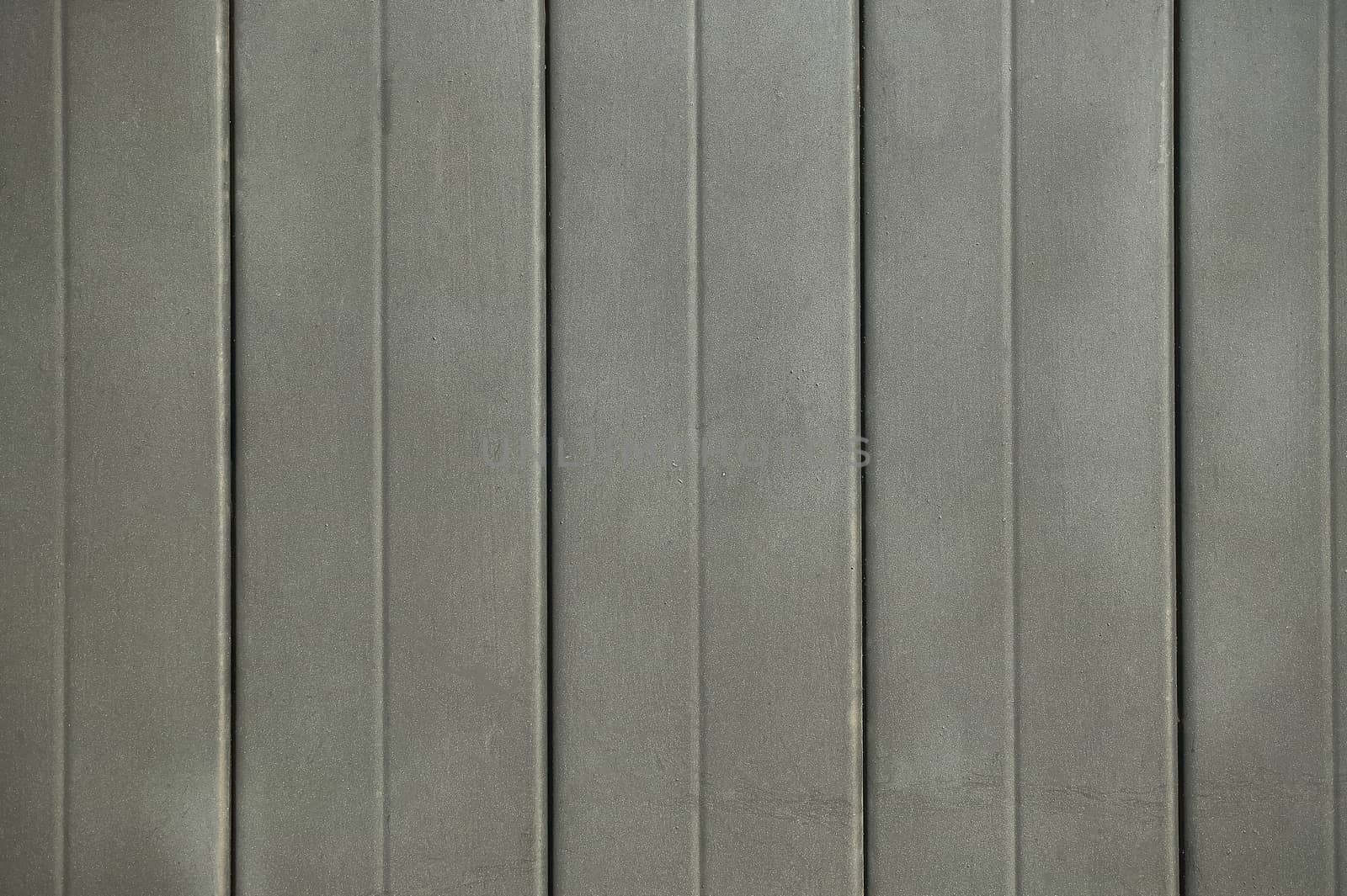 Texture of an iron or metal wall painted in metallic black: ideal image as a background or as texture in graphic projects.