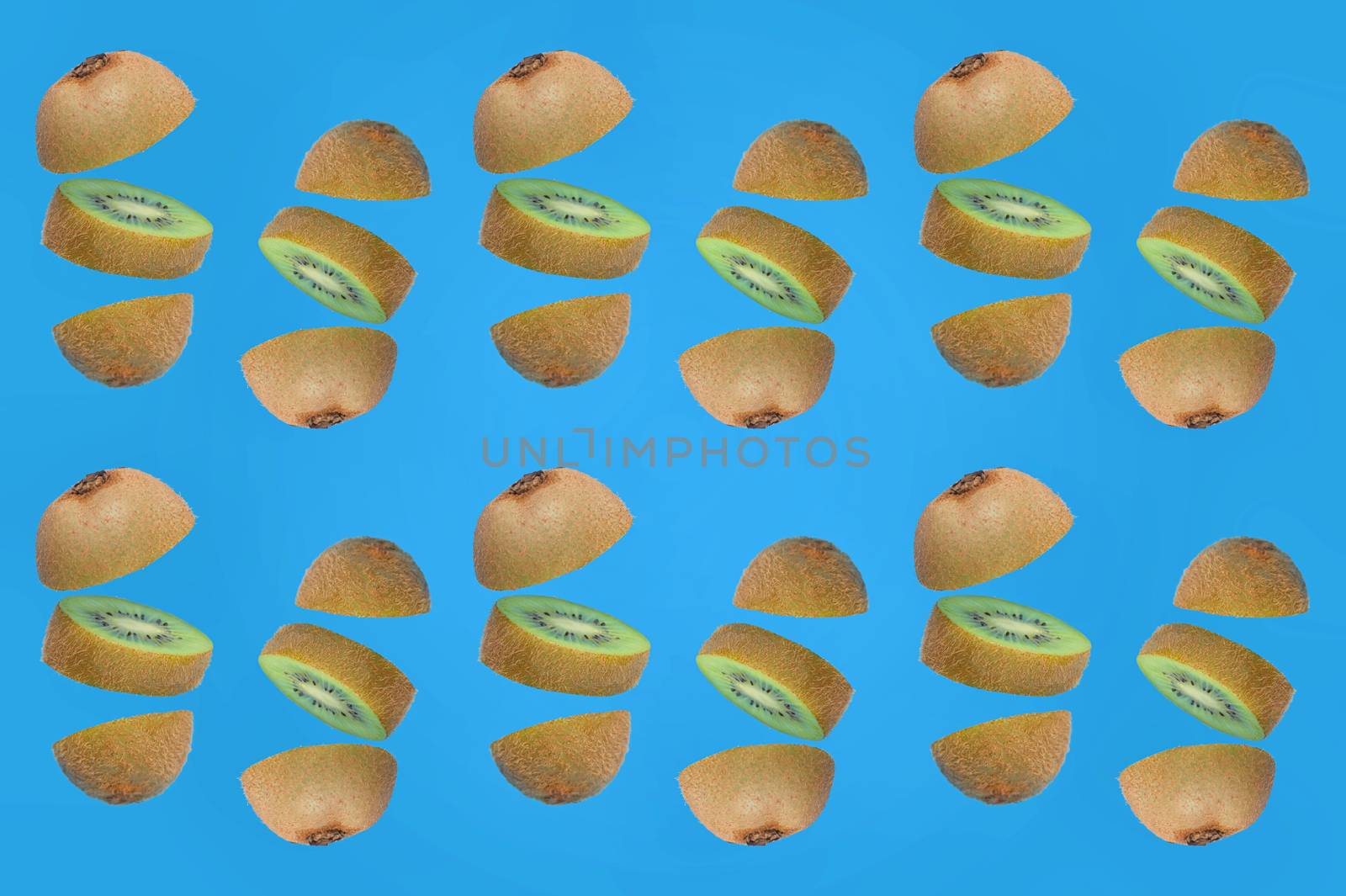 Pattern Of Fresh Kiwi Slices on Blue Background