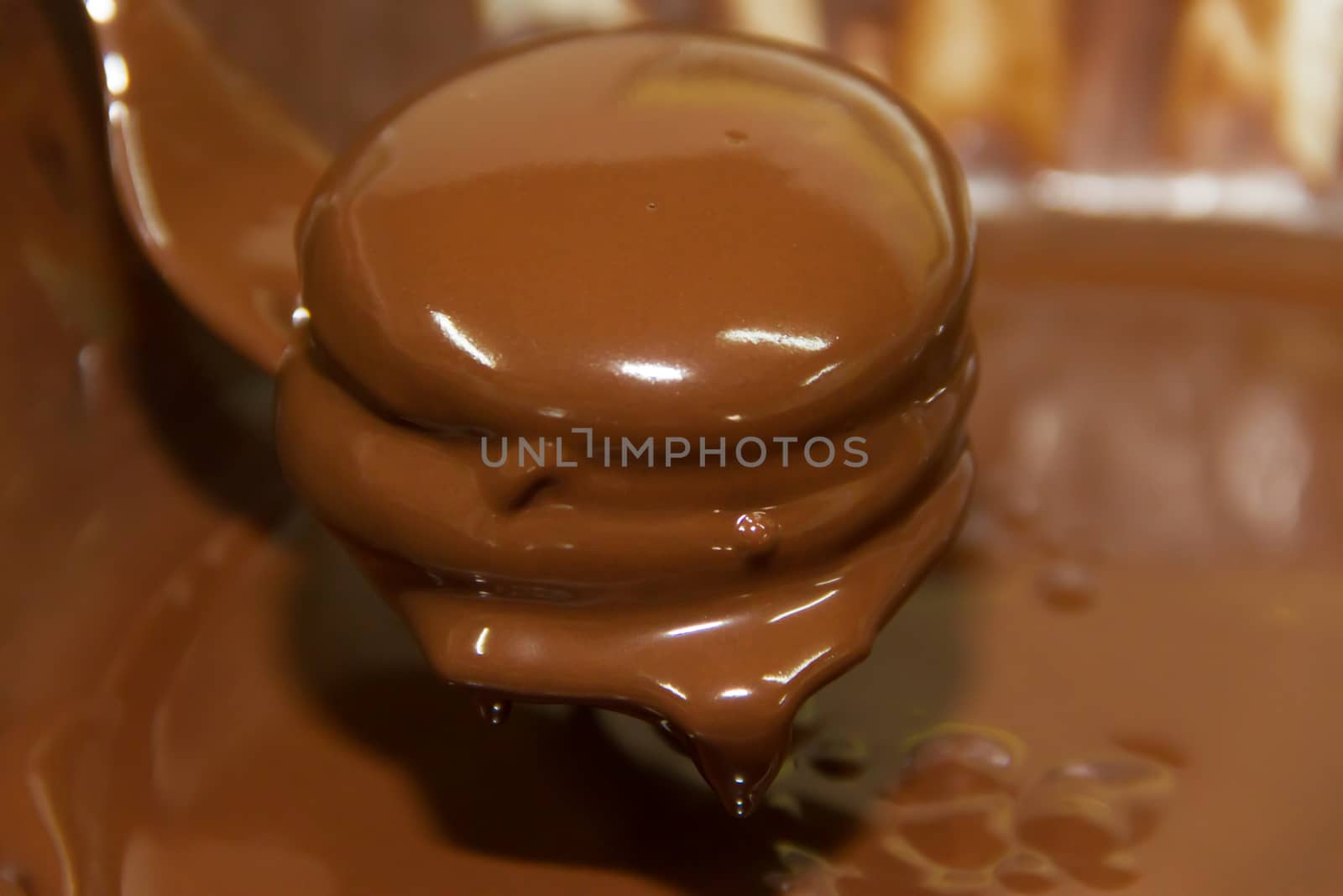 preparation of alfajores of dulce de leche bathed in chocolate by GabrielaBertolini