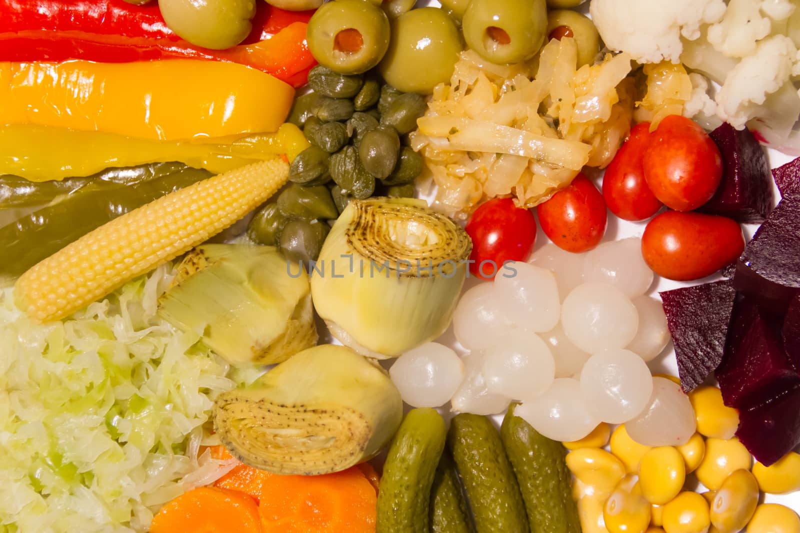 background pickles of assorted vegetables seen from above by GabrielaBertolini
