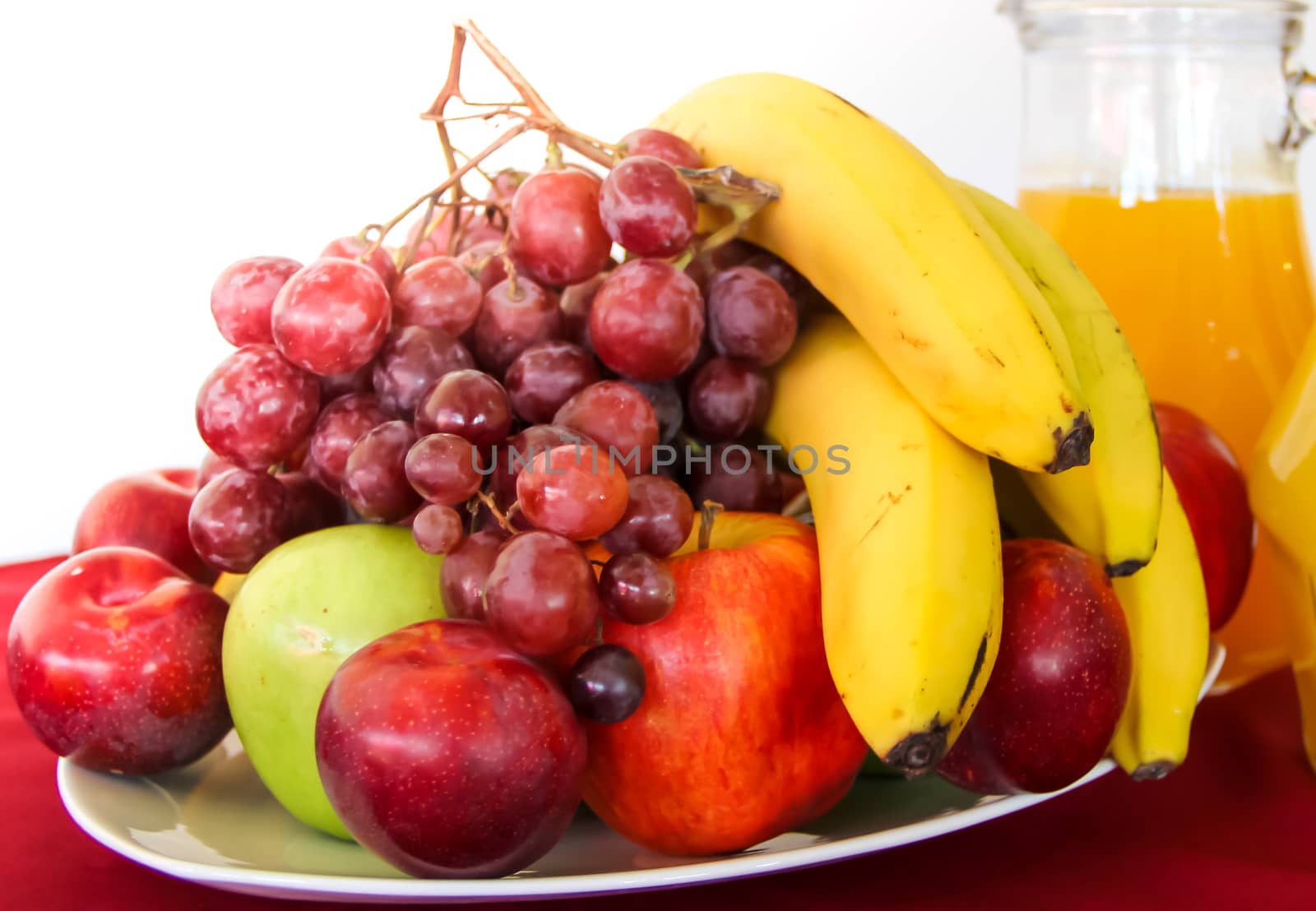 variety of fresh fruits served on a plate by GabrielaBertolini