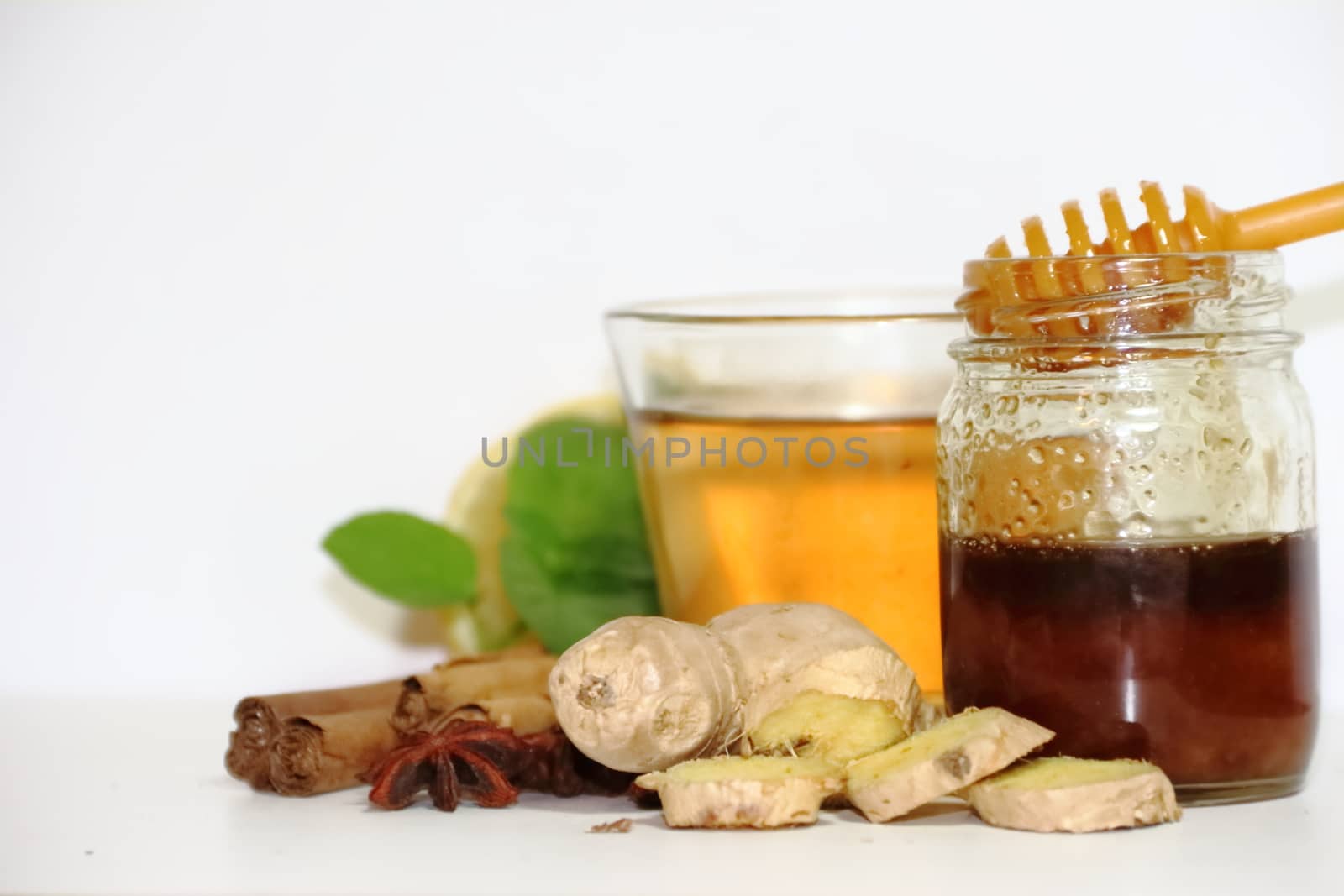 healthy tea of ginger mint lemon cinnamon curcuma anis and honey