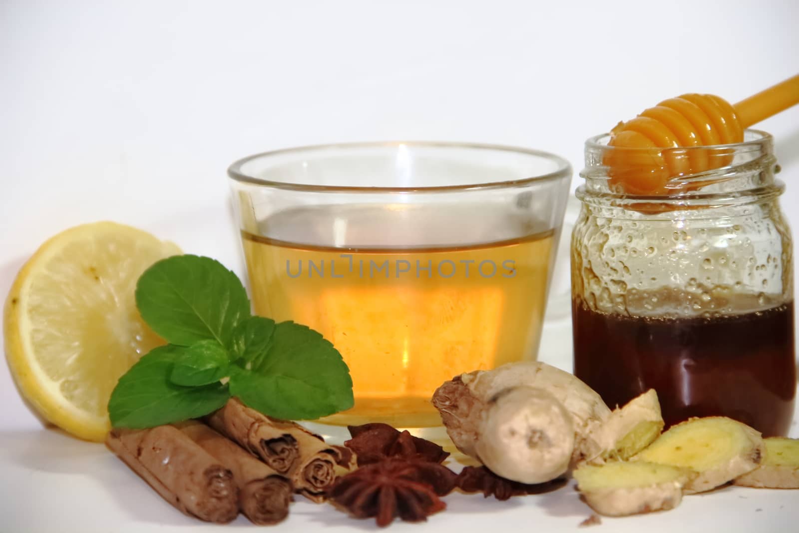 healthy tea of ginger mint lemon cinnamon curcuma anis and honey