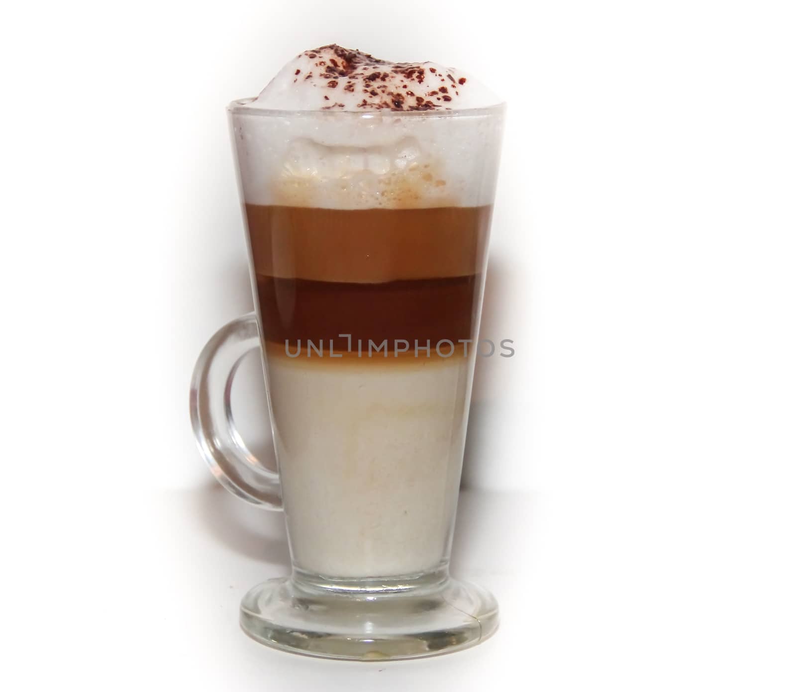 cappuccino in tall glass on white background