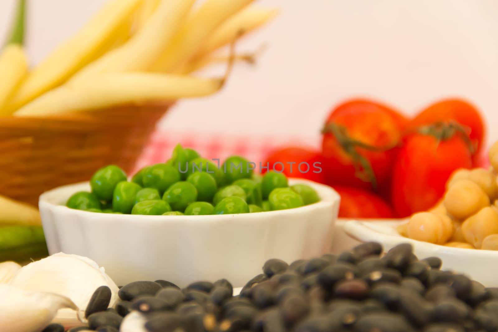 variety of kitchen ingredients with fresh and dried legumes