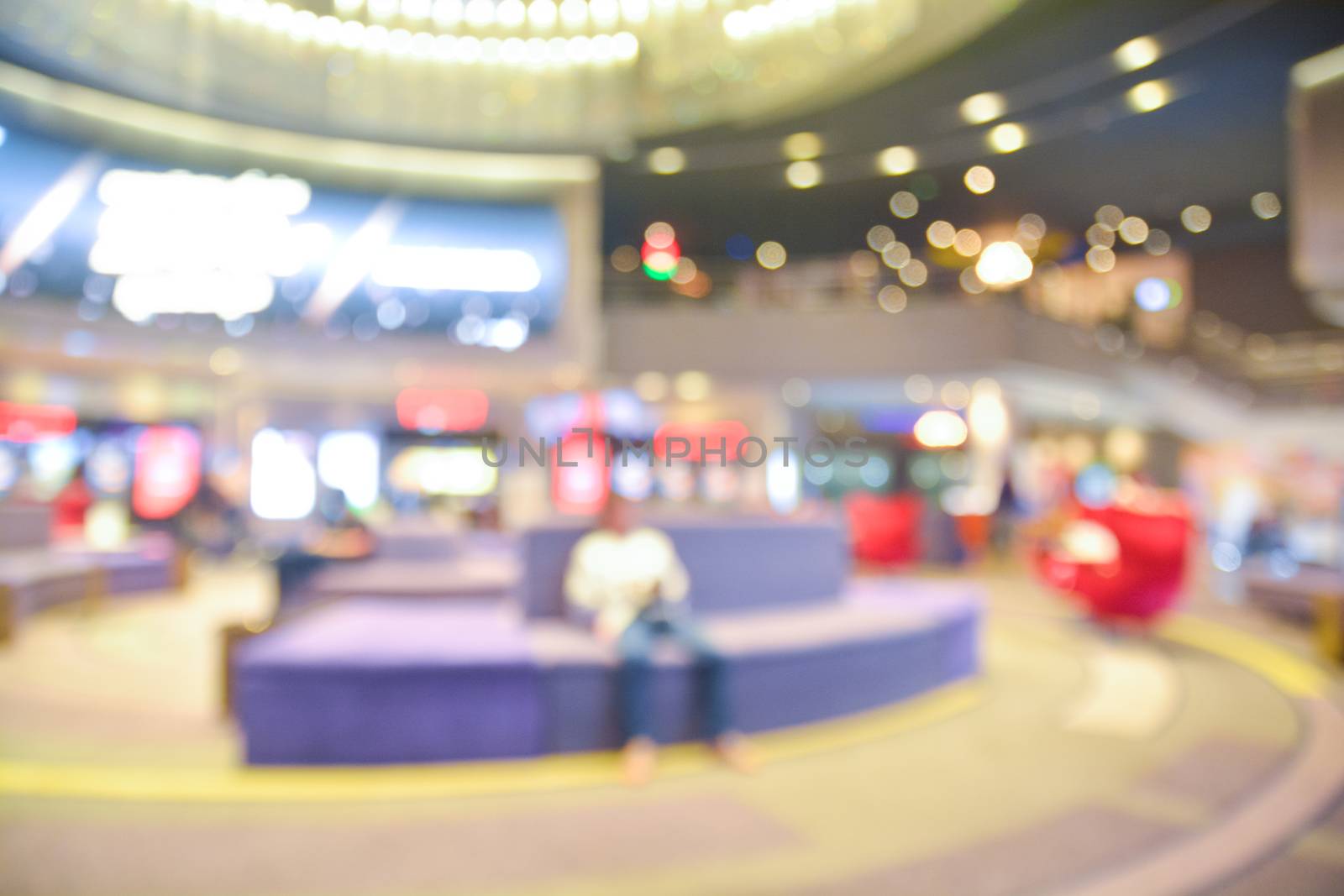 Blur of Defocus Background of People Waiting in Movie or Cinema  by thampapon