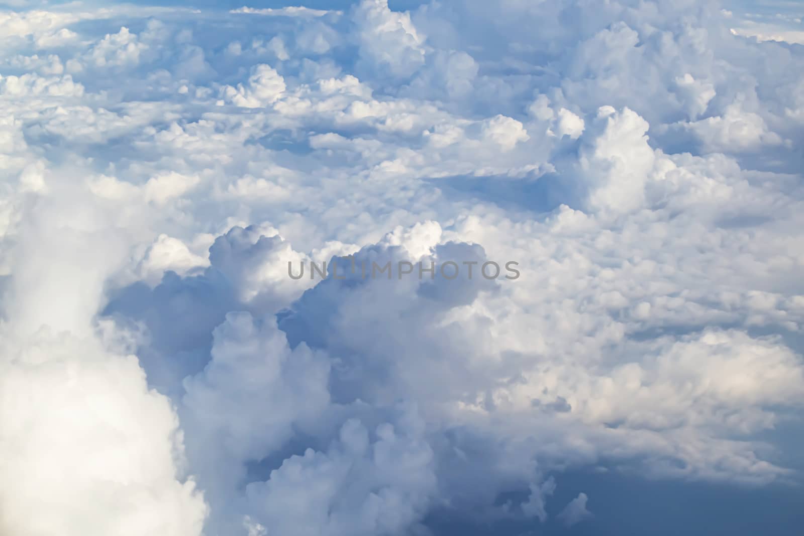 The Beautiful sky with white clouds taken picture on airplane