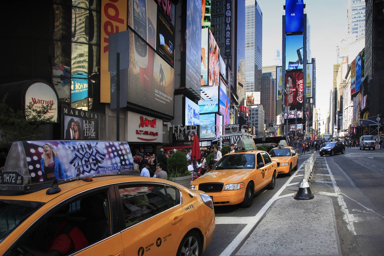 New York, NY, USA - May 17, 2013: Times Square, featured with Broadway Theaters and huge number of LED signs, is a symbol of New York City and the United States, October 12, 2012 in Manhattan, New York City