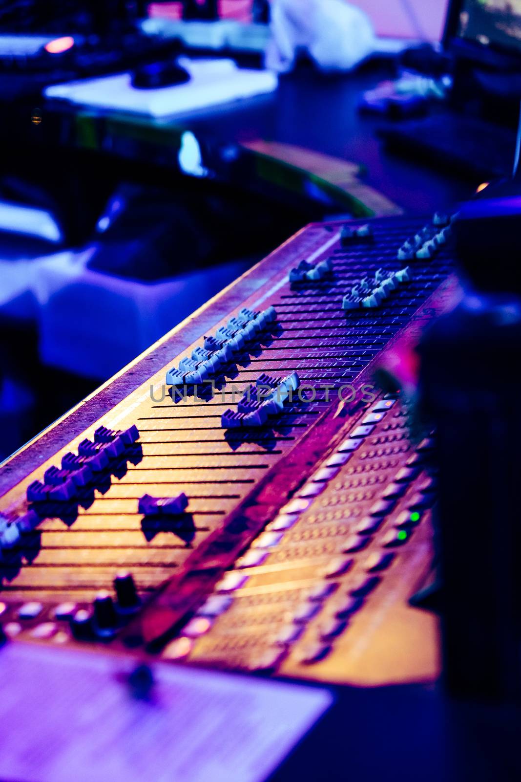 Closeup of an audio mixing control panel