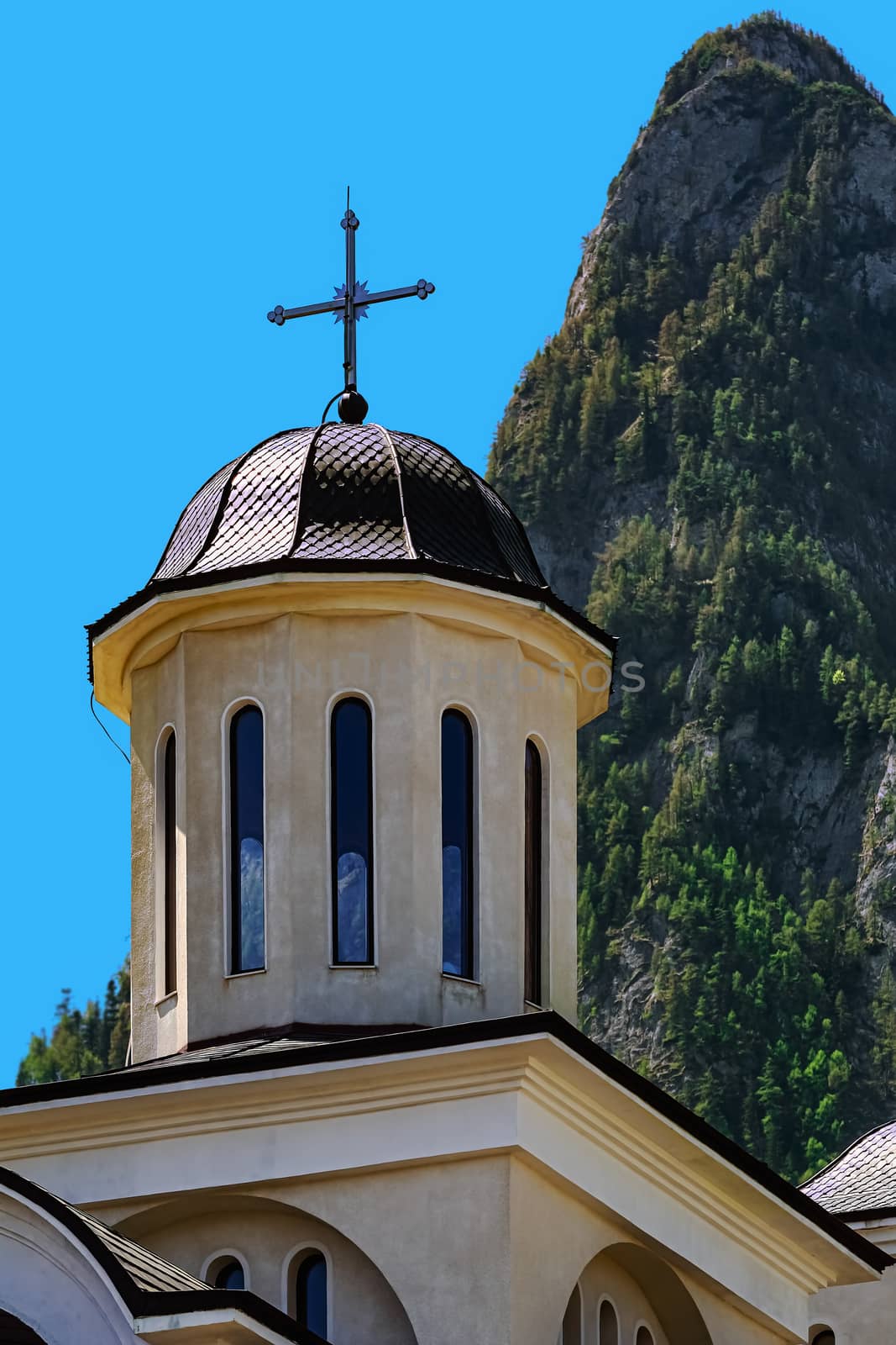 Caraiman Monastery Church against the Peak of Bucegi Mountains