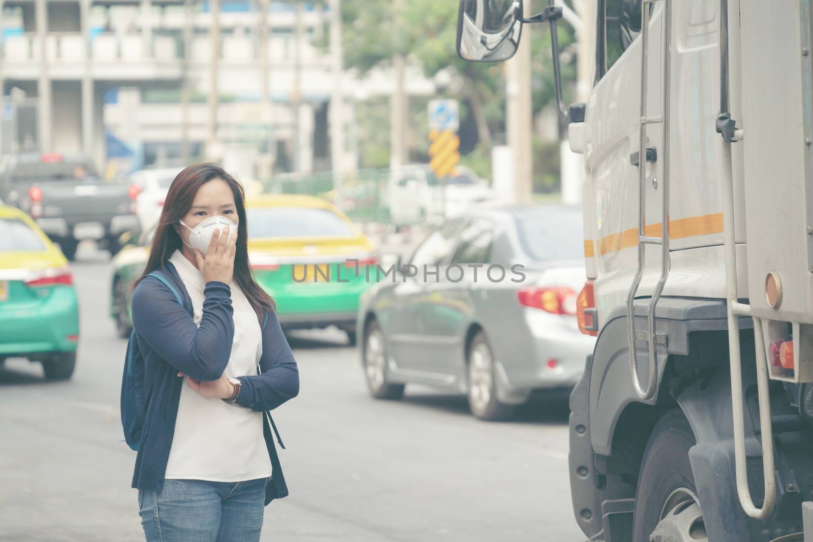 woman wearing protective mask in the city street, Bangkok thailand