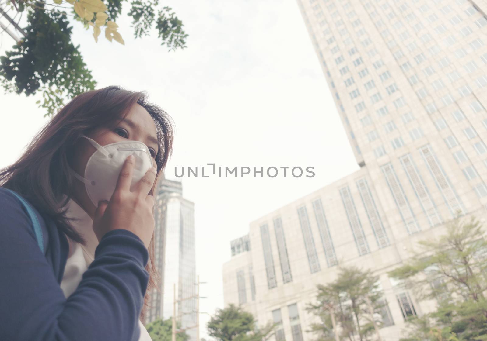 woman wearing protective mask in the city street, Bangkok thailand