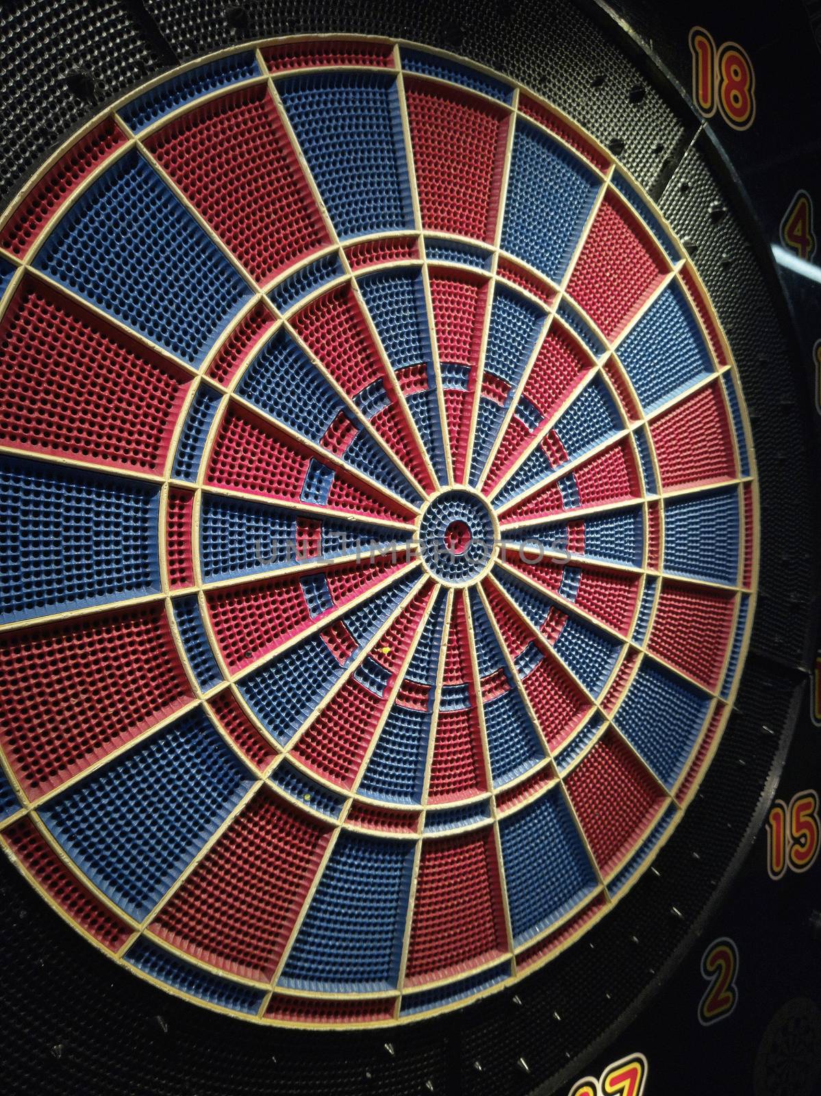 Target for darts with the center in evidence.