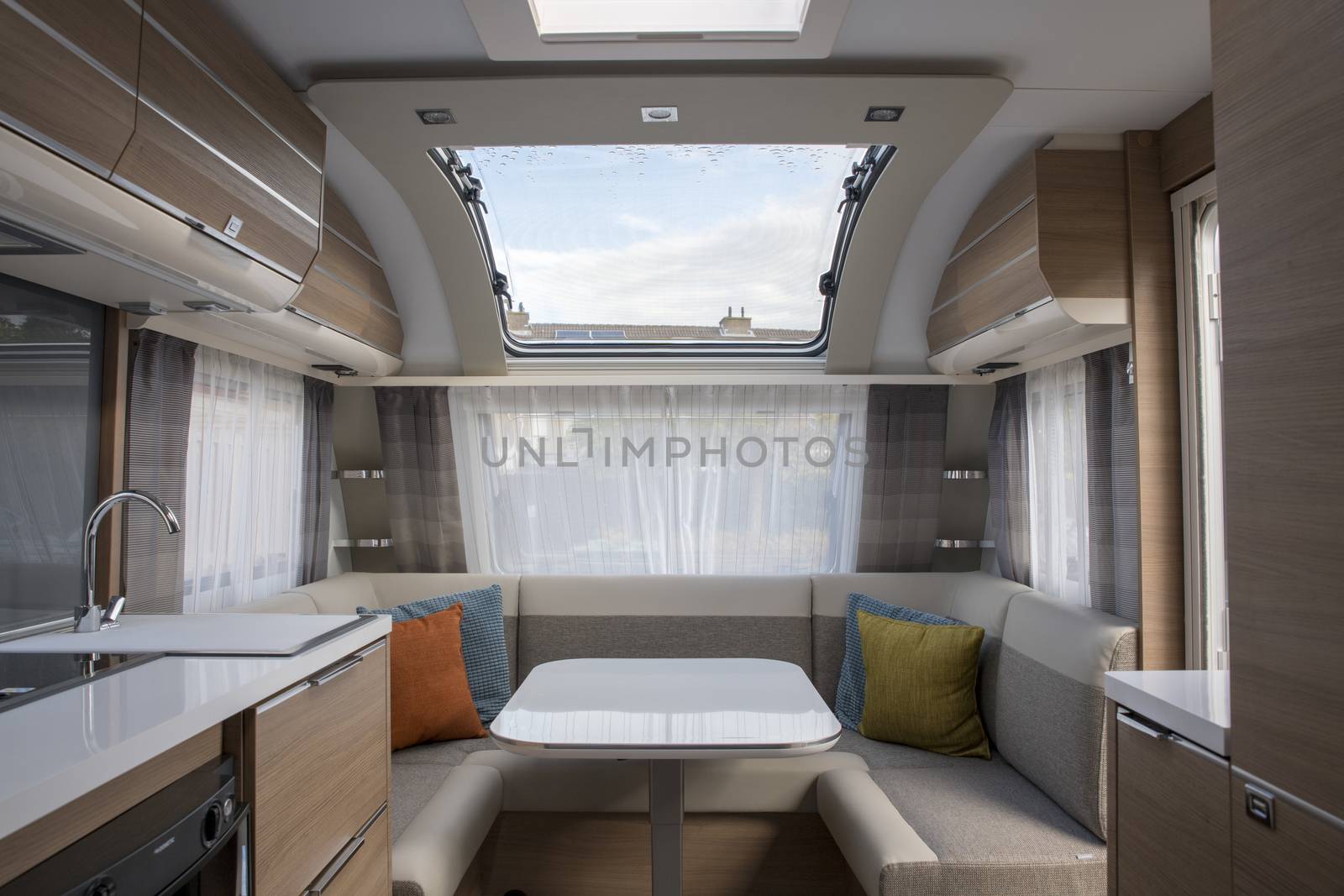 indoor of new expensive caravan with big roof window