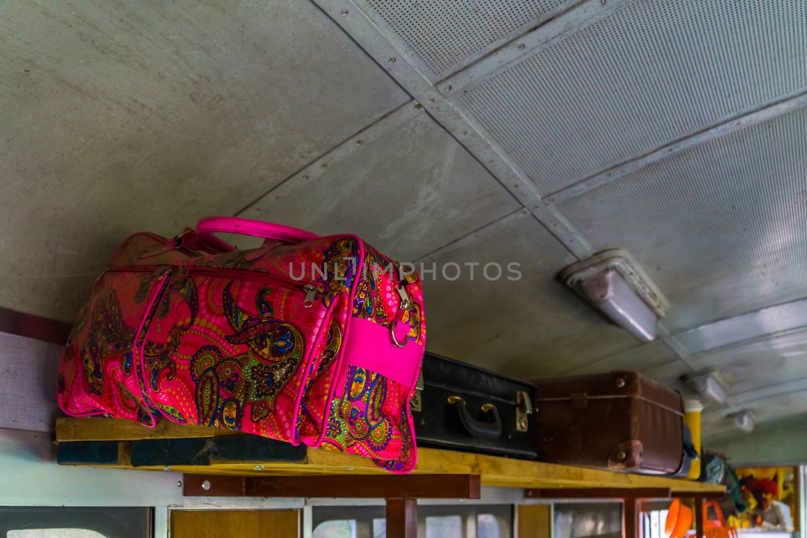 Passengers baggage on a wooden shelf in a old train wagon, Nostalgic transportation and travel background