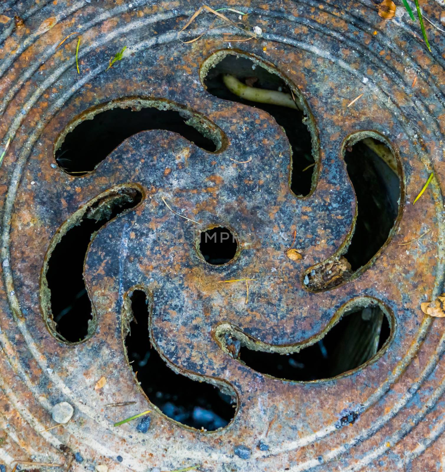 closeup of the lid of a small pit, Drain access point, classical architecture background