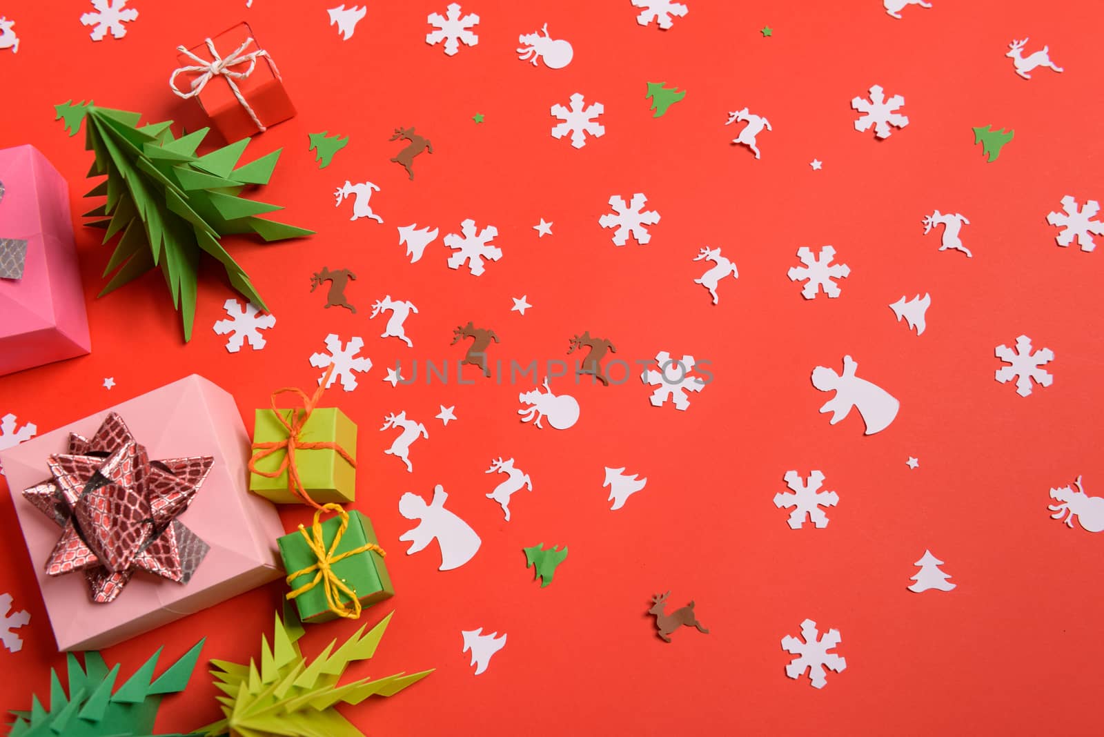 Christmas or New Year background, plain composition made of Xmas decorations and fir branches, flat lay, blank space for a greeting text.