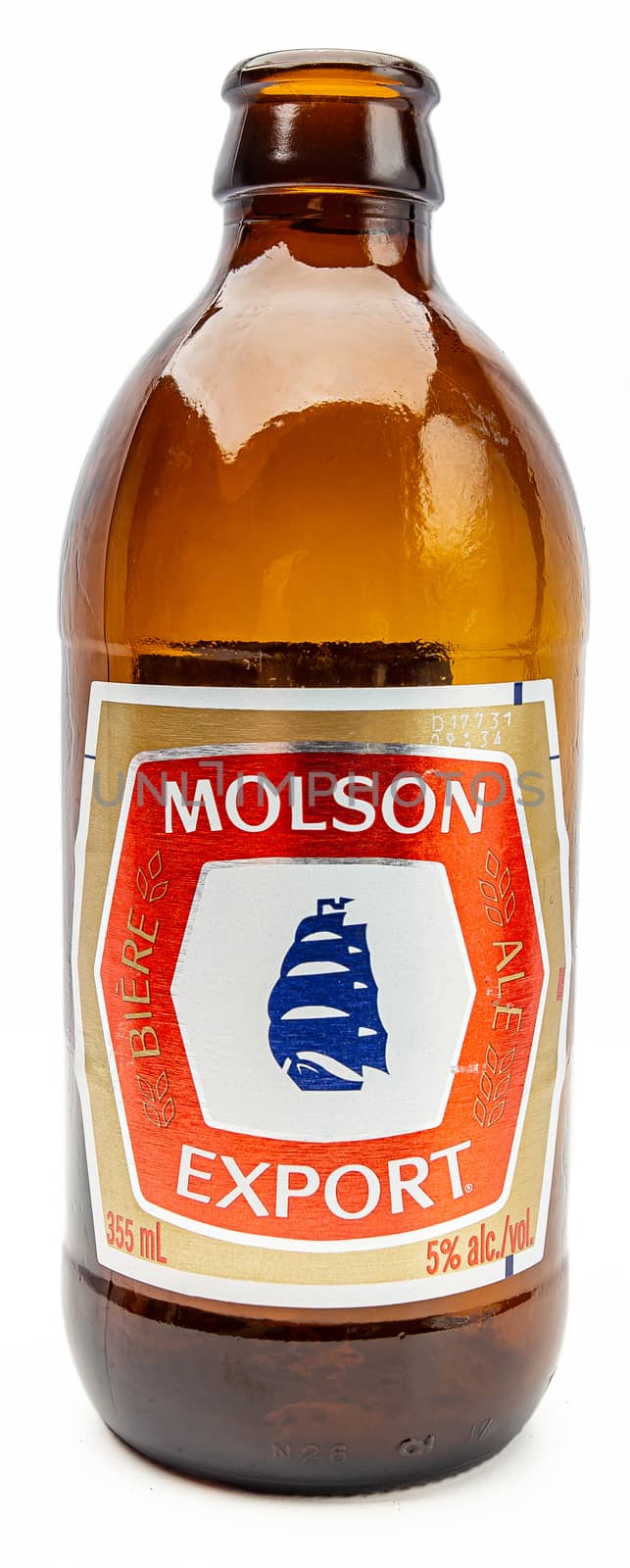 Old Molson Export beer bottle isolated against white background