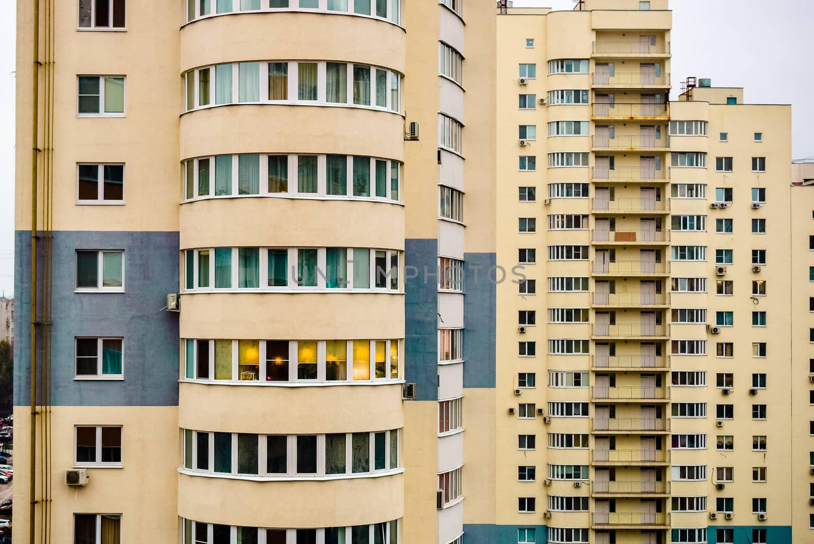 multi-storey houses with bright rskraskoy on a cloudy day