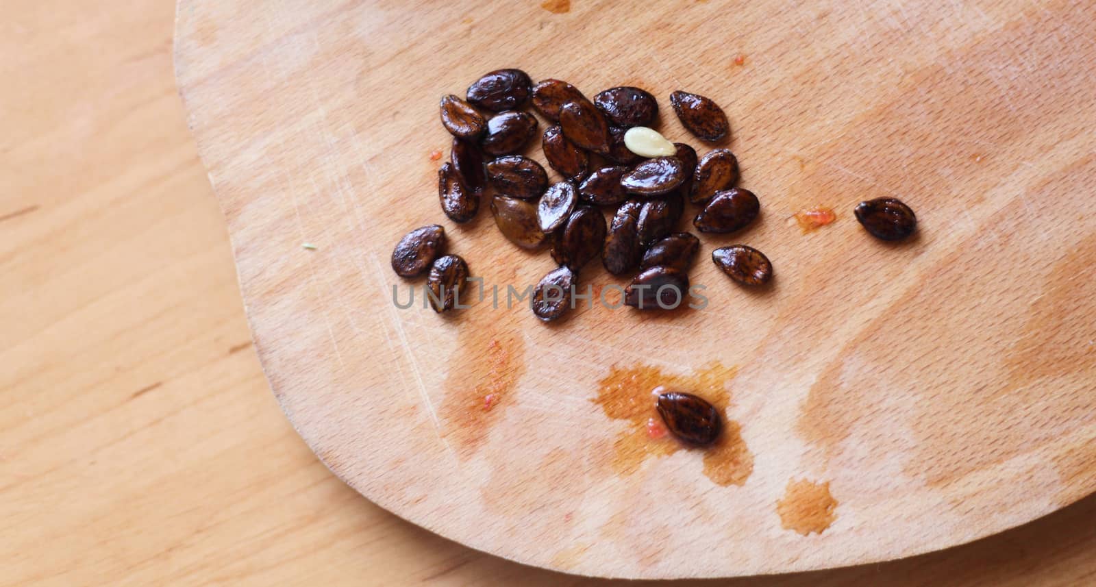 on a wooden board watermelon seeds.