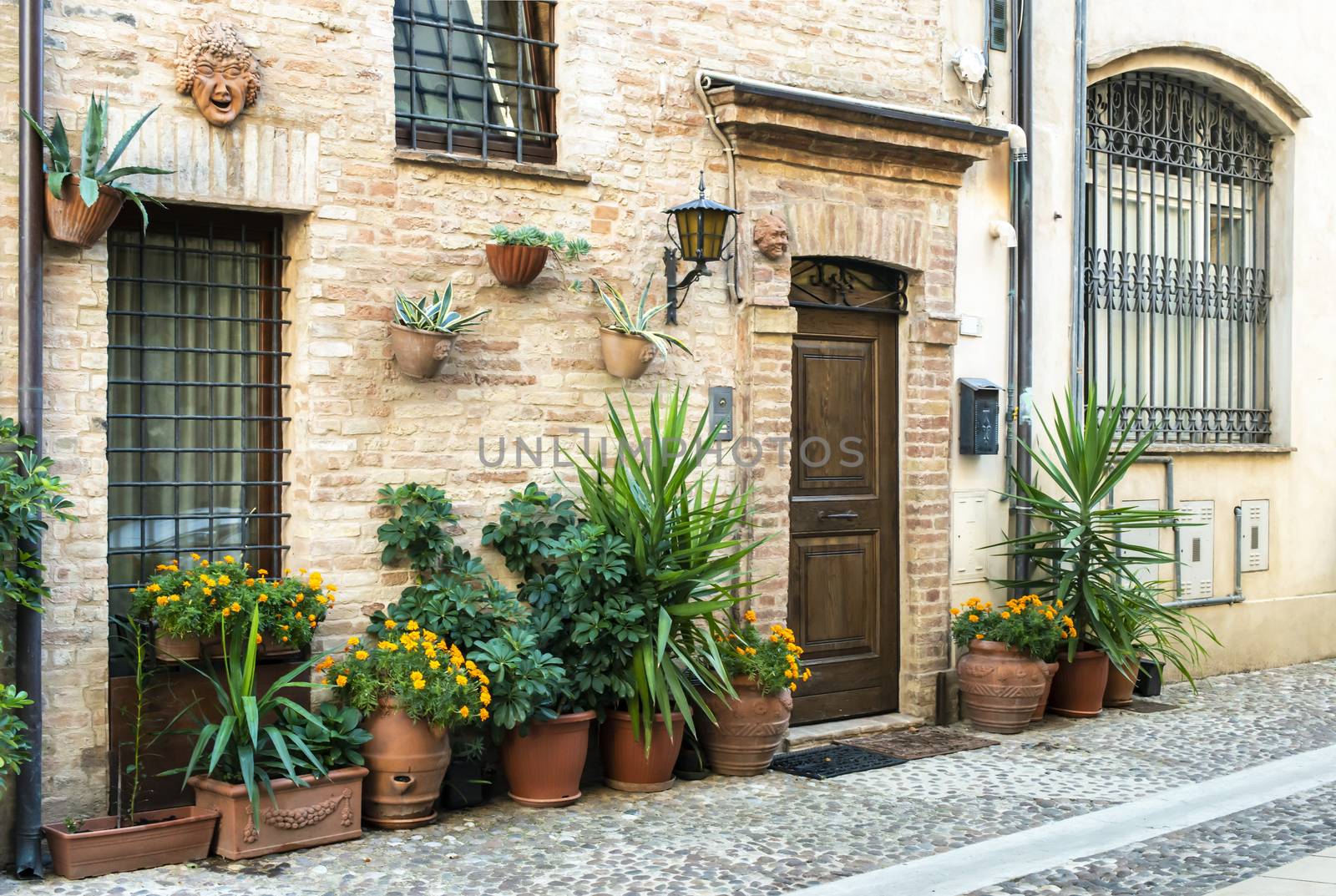 Old buildings on small italian street. Narrow street in Italy. by deyan_georgiev