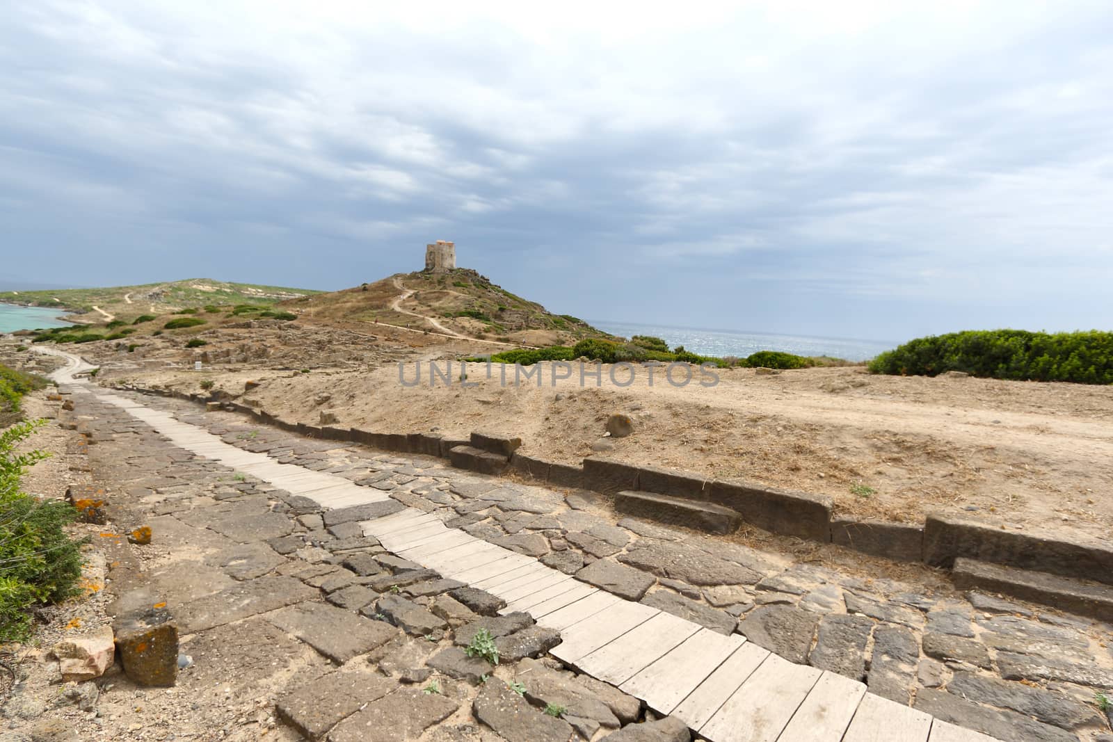 Cabras, Italy - 4 July 2011: the archaeological site of Tharros in the province of Oristano by antonionardelli