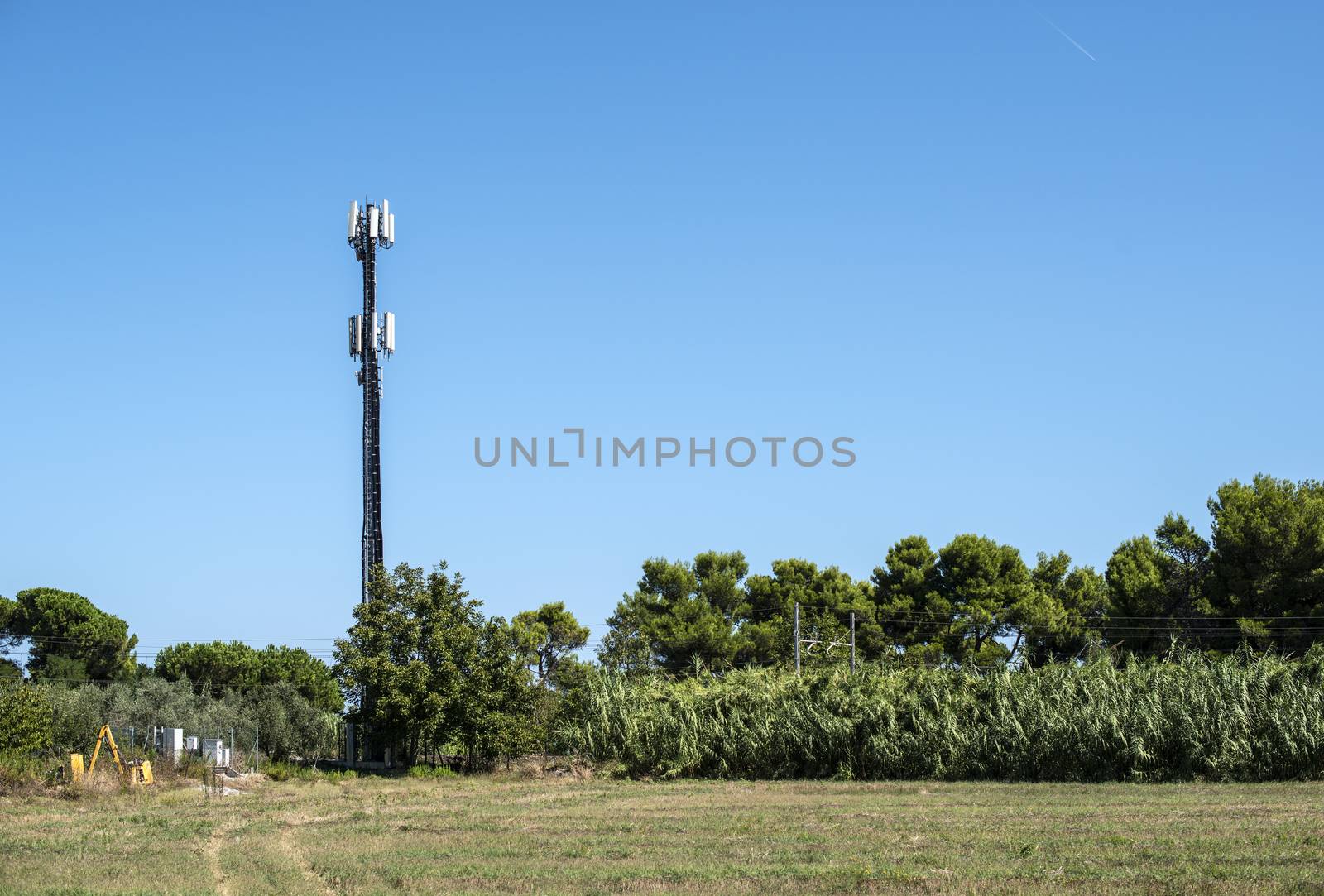 Telecommunication 5G transmitters. GSM antenna on blue sky.  by deyan_georgiev