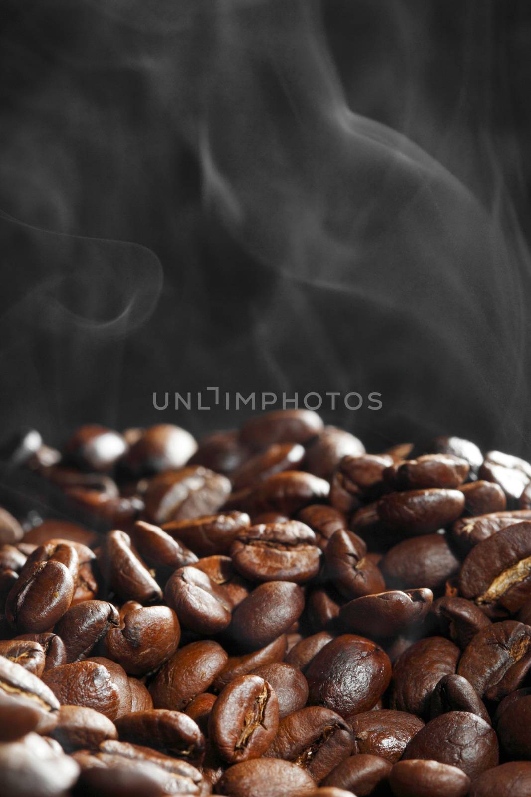 Hot roasted coffee beans by Yellowj
