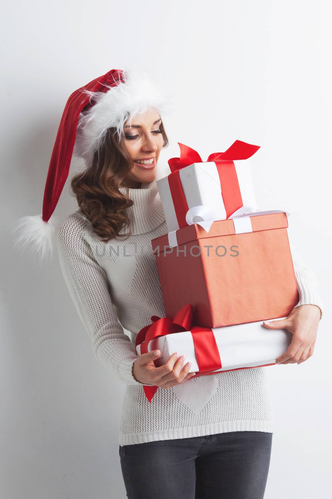 Woman with stack of gifts by Yellowj