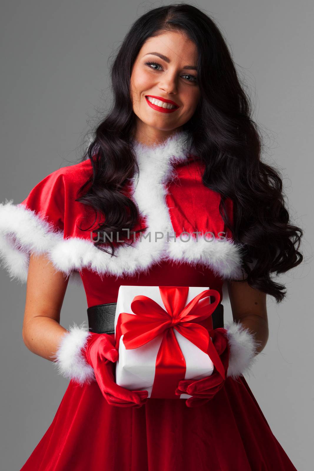 Woman in red Santa Claus outfit by Yellowj