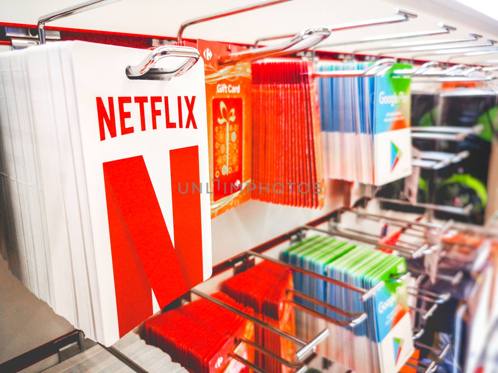 Netflix Gift cards for the streaming subscription service in a shelf of a super store shop in Bologna, Italy, 9 Nov 2019