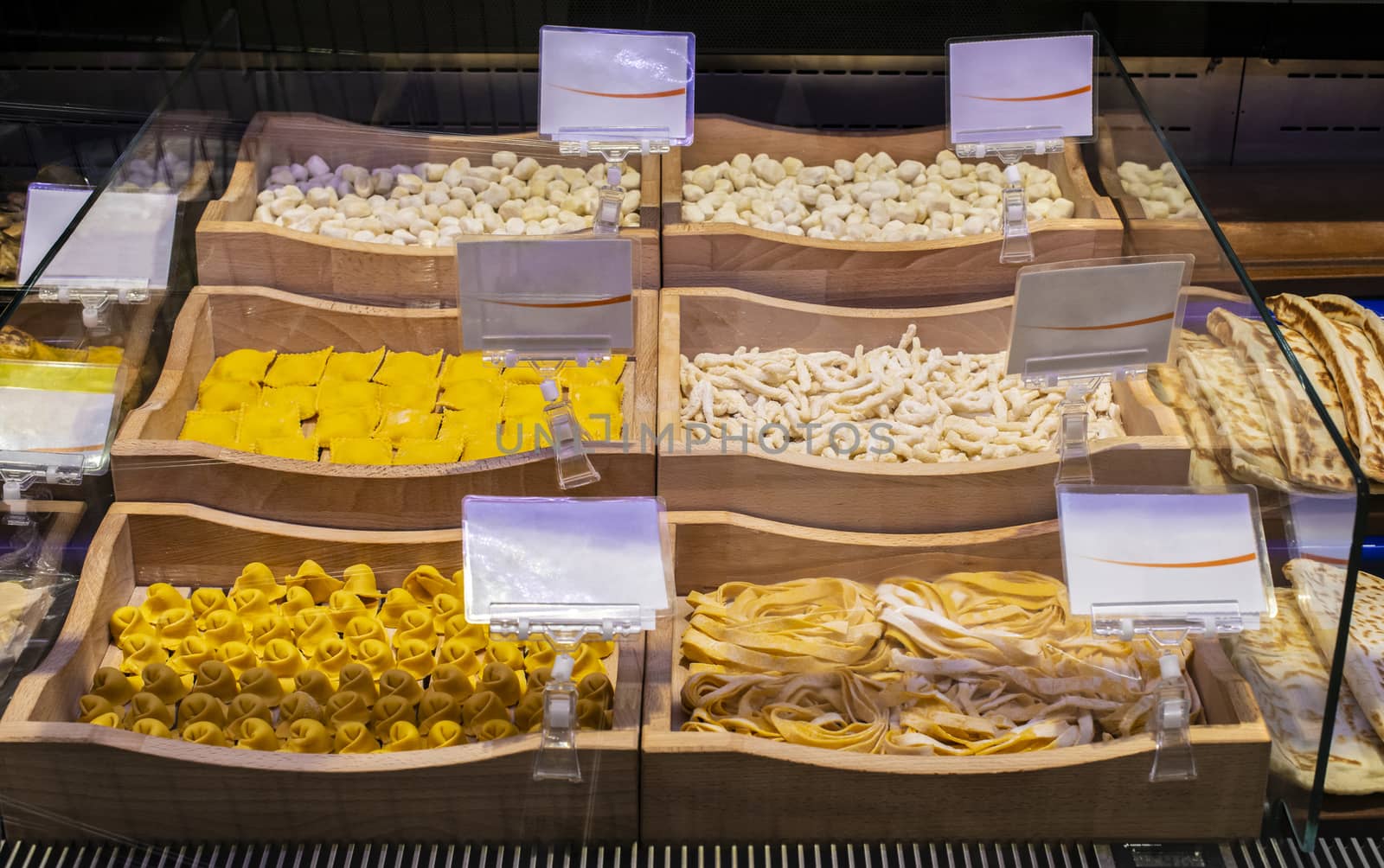 Italian pasta in supermarket. Fresh pasta. by deyan_georgiev