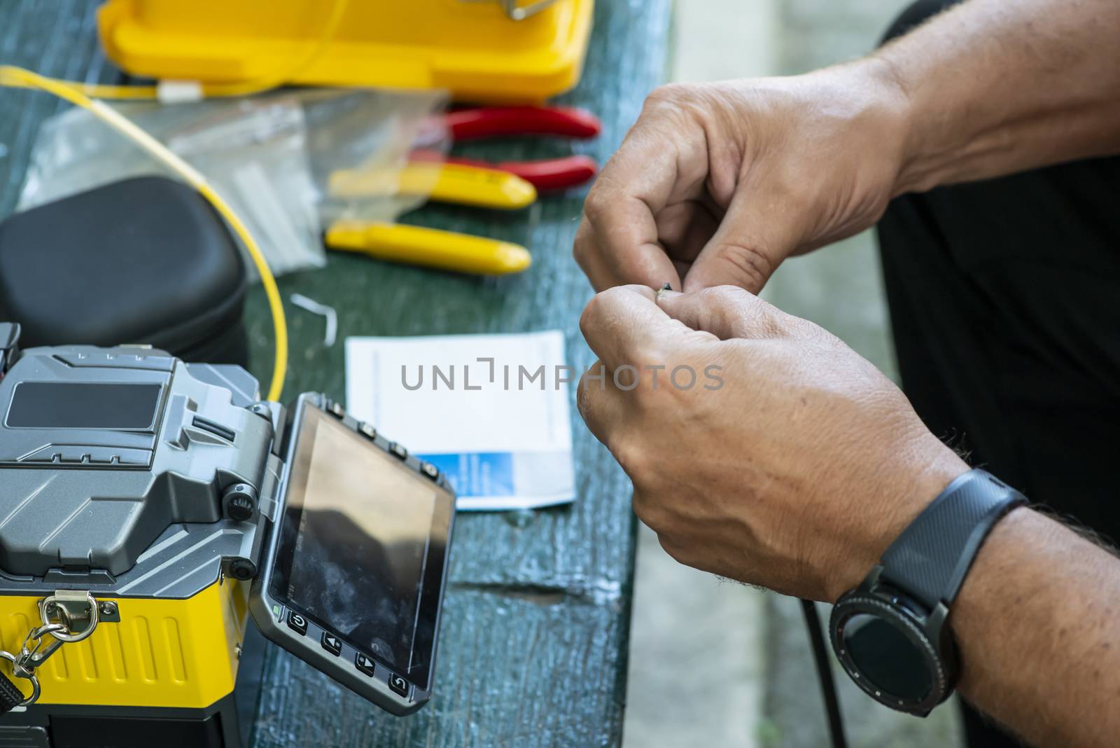 Device for mounting optical cable. Optical internet Technology c by deyan_georgiev