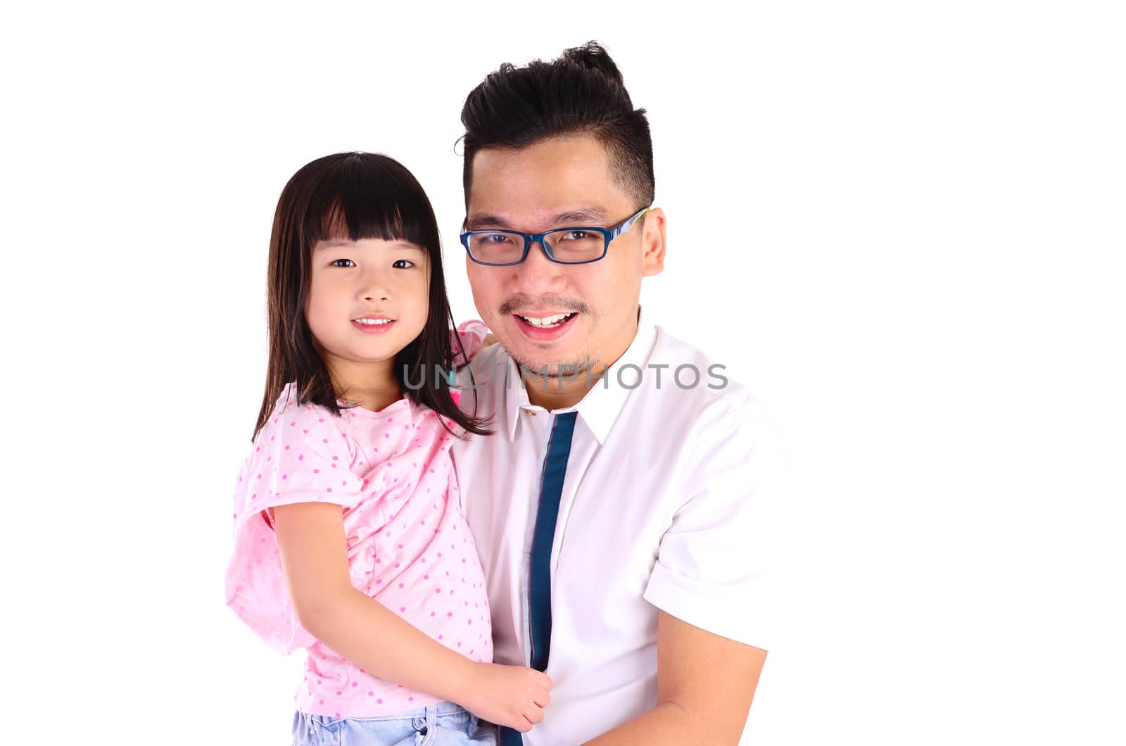 Asian father and his daughter looking at camera